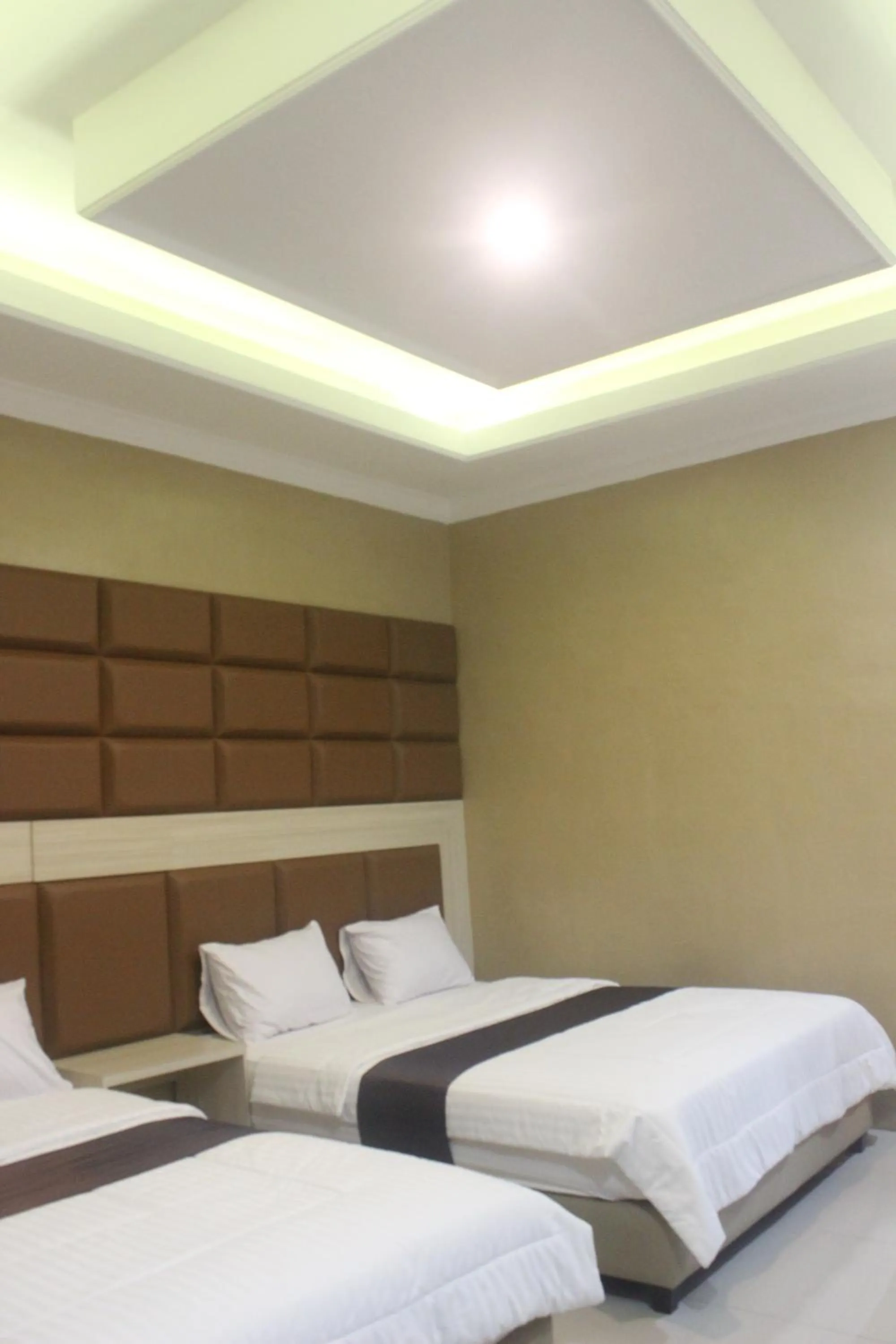 Bed in Cyka Raya Hotel