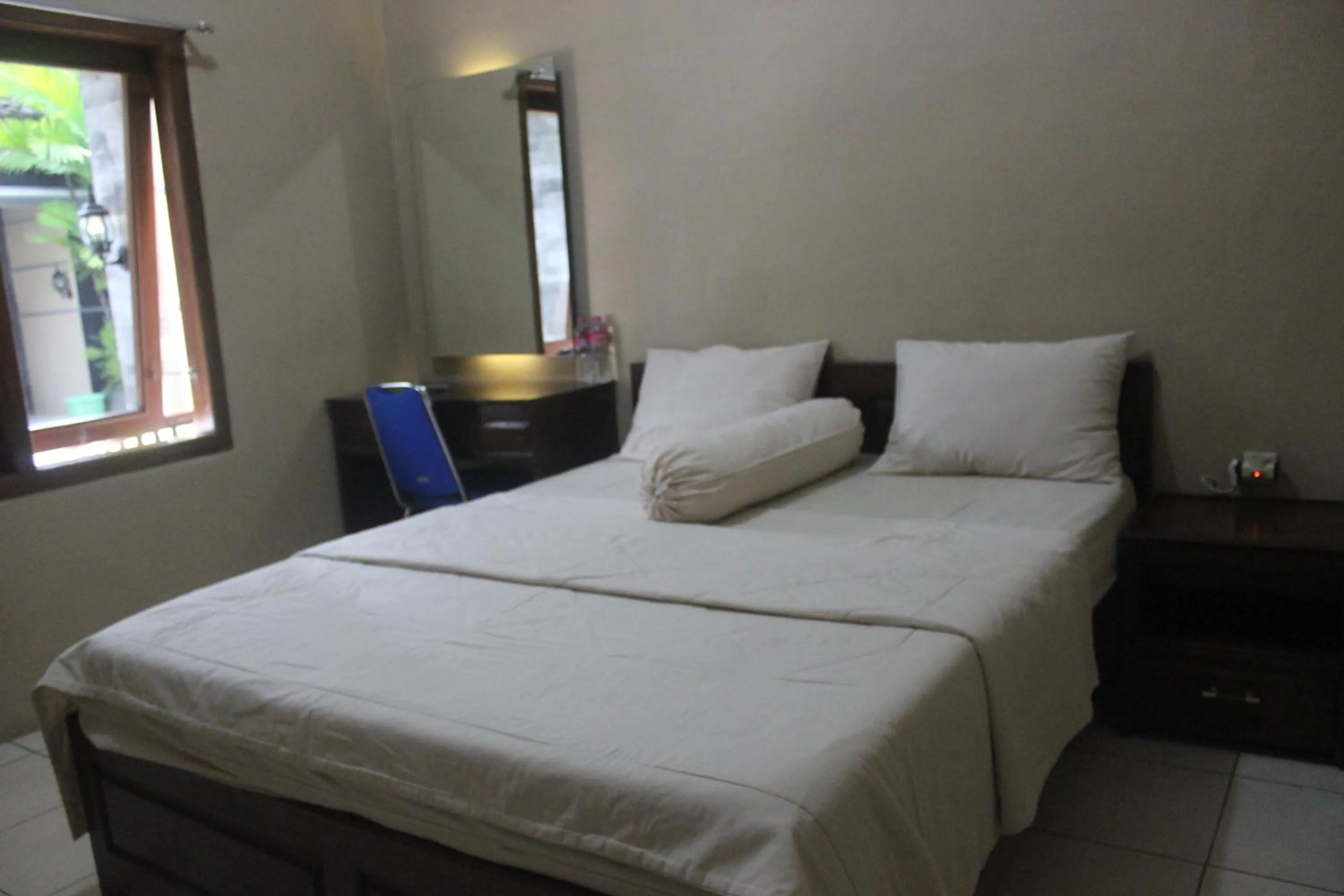 Bed in Cyka Raya Hotel