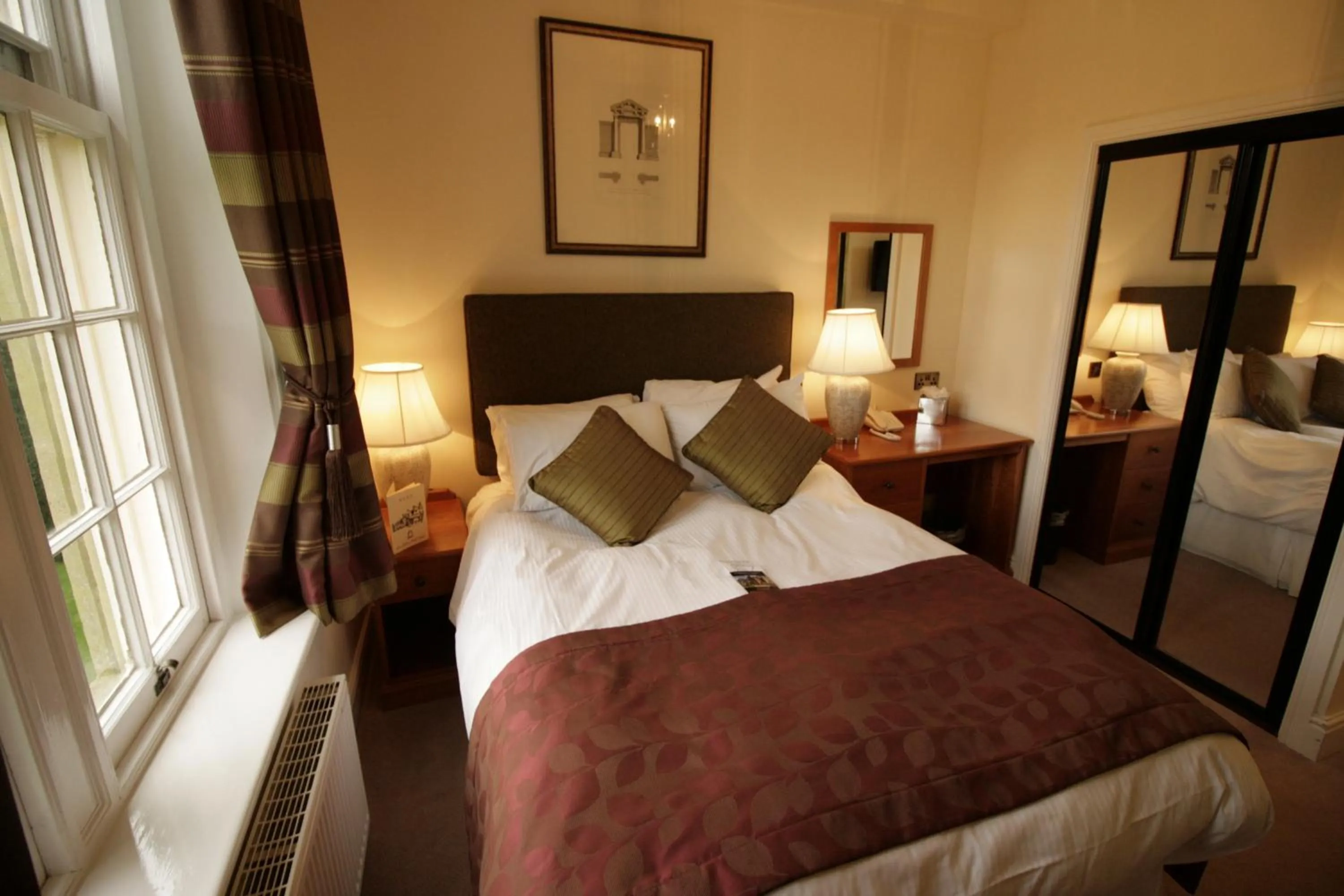 Bed in Dumbleton Hall Hotel