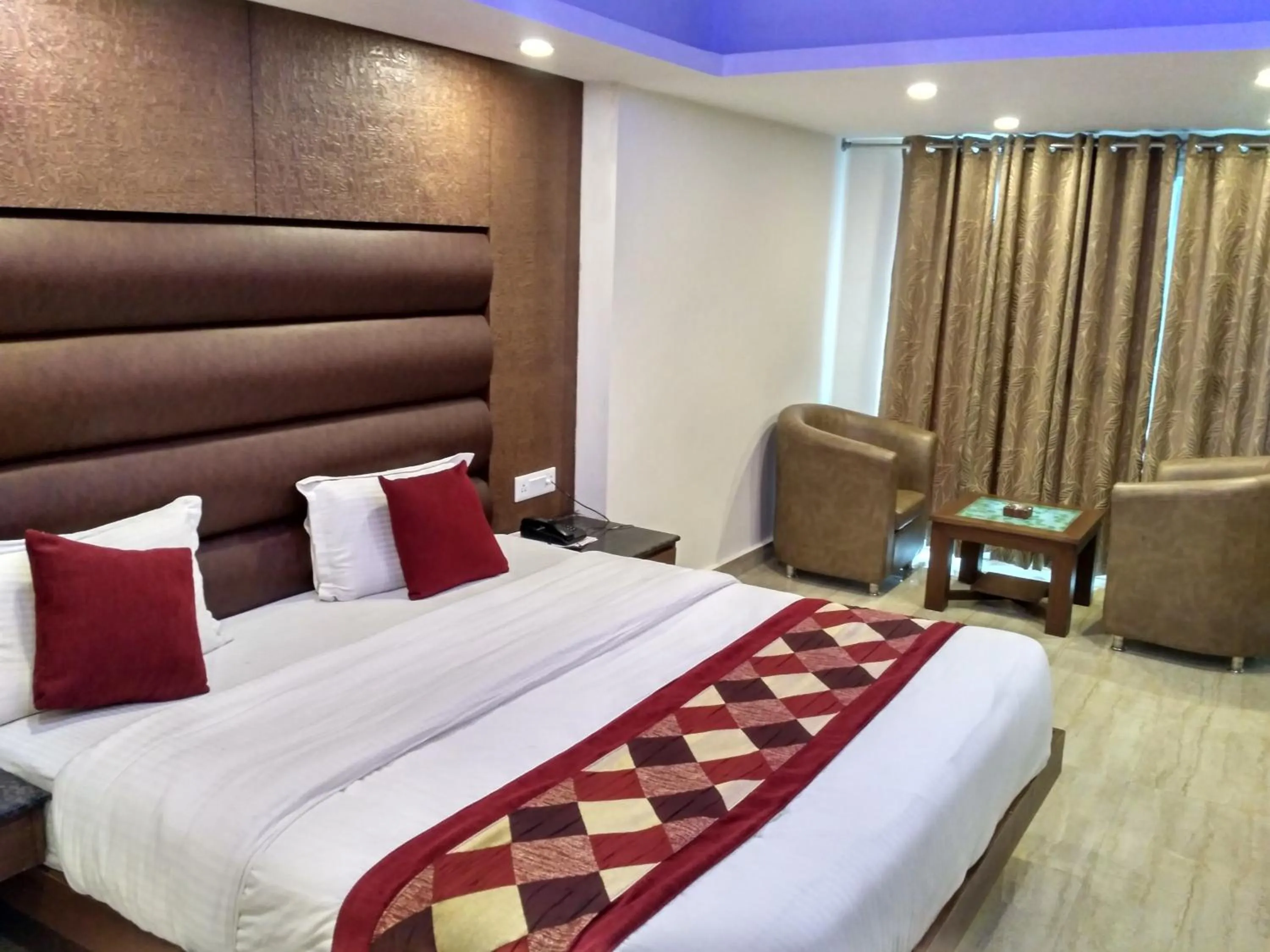 Bed in Hotel Hamers International