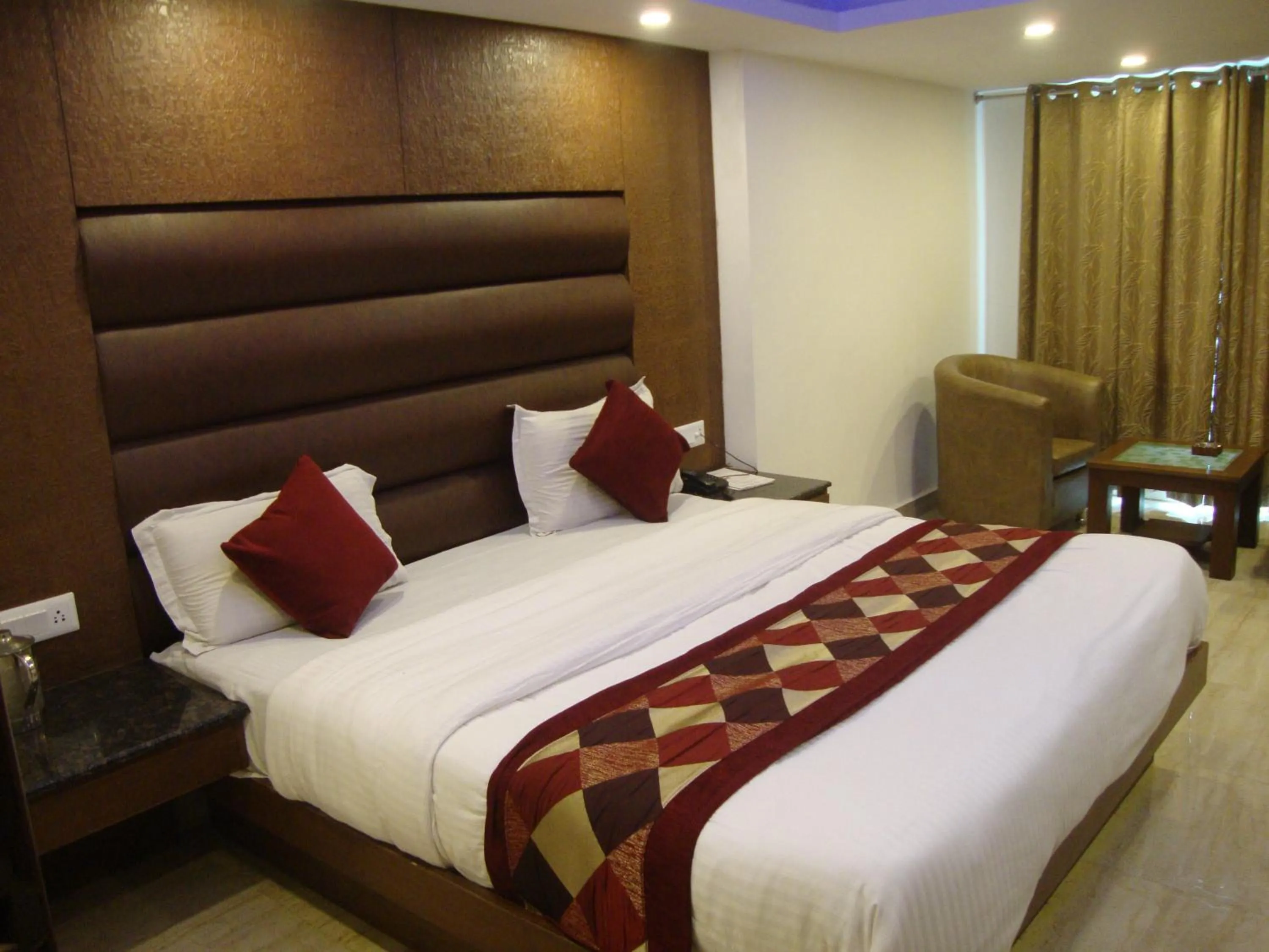 Bed in Hotel Hamers International