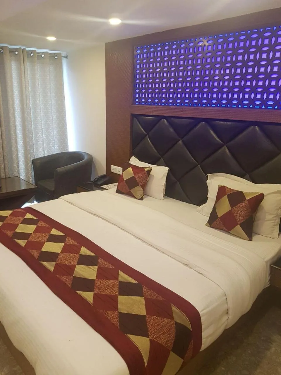 Bed in Hotel Hamers International