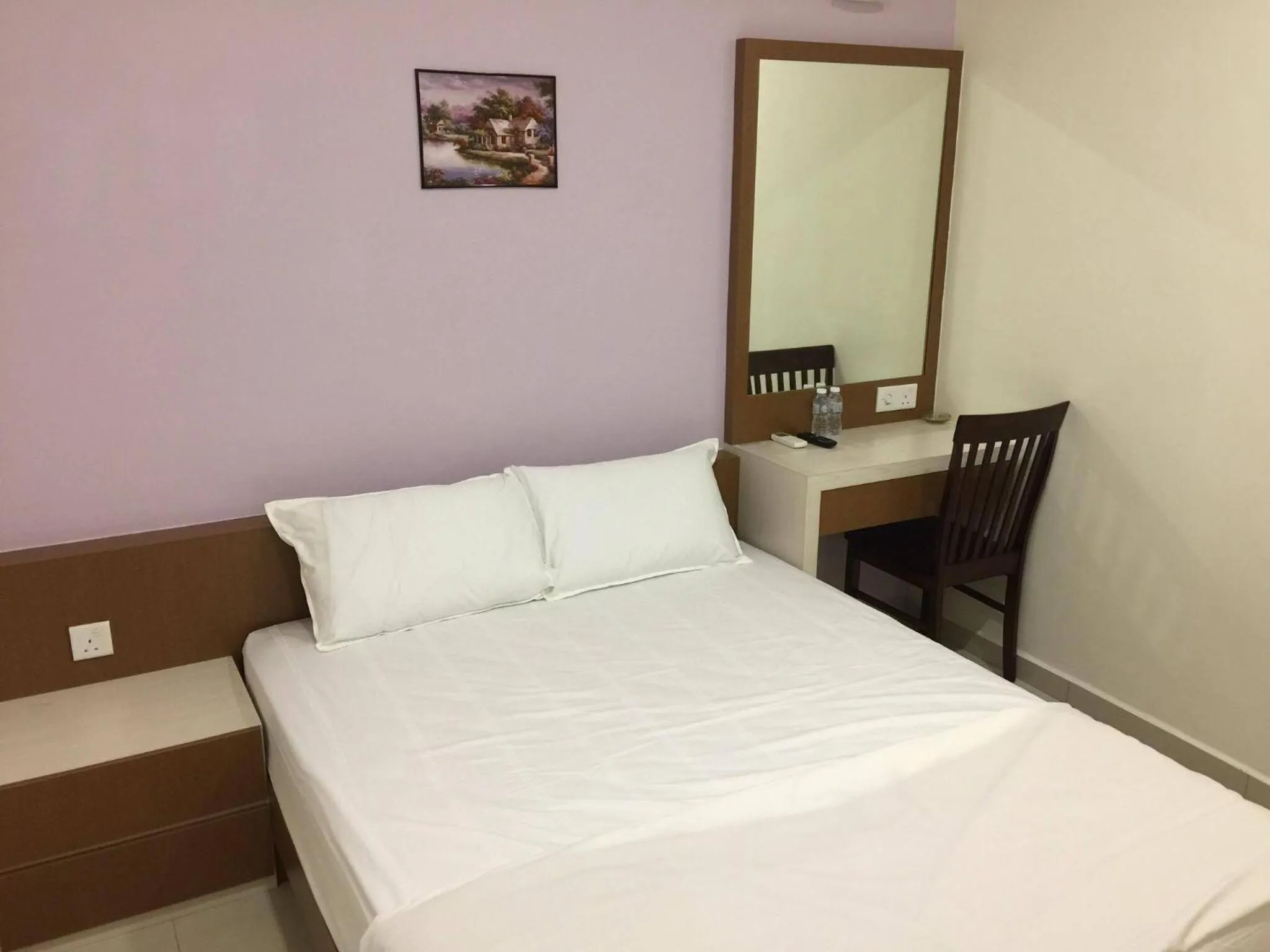 Bed in Hi Star Hotel