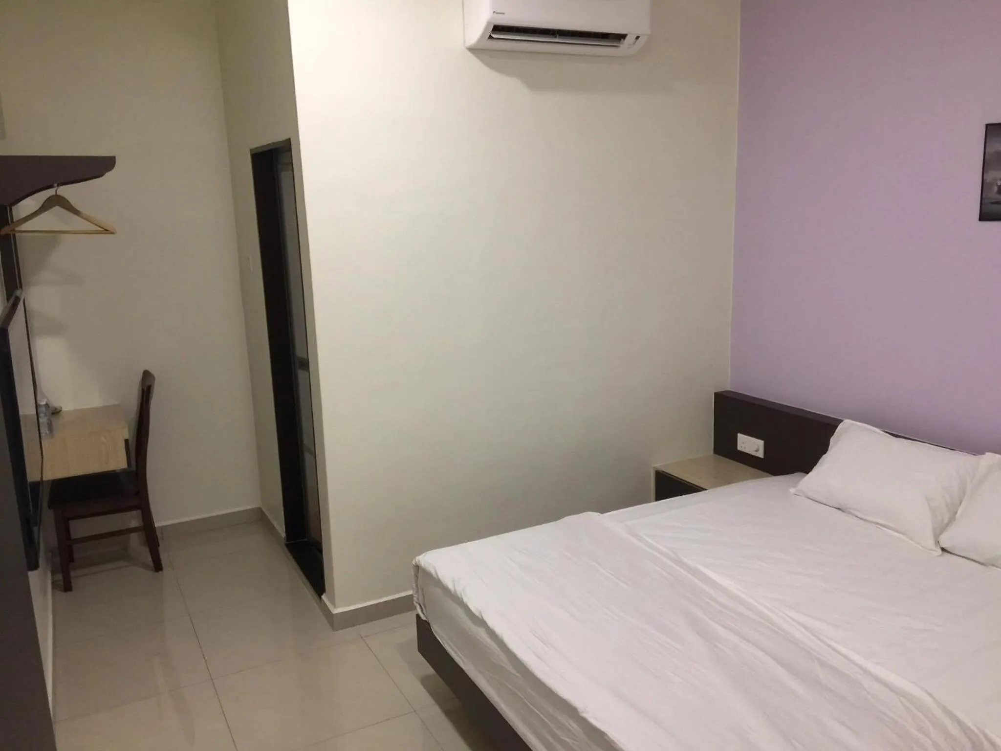 Bed in Hi Star Hotel