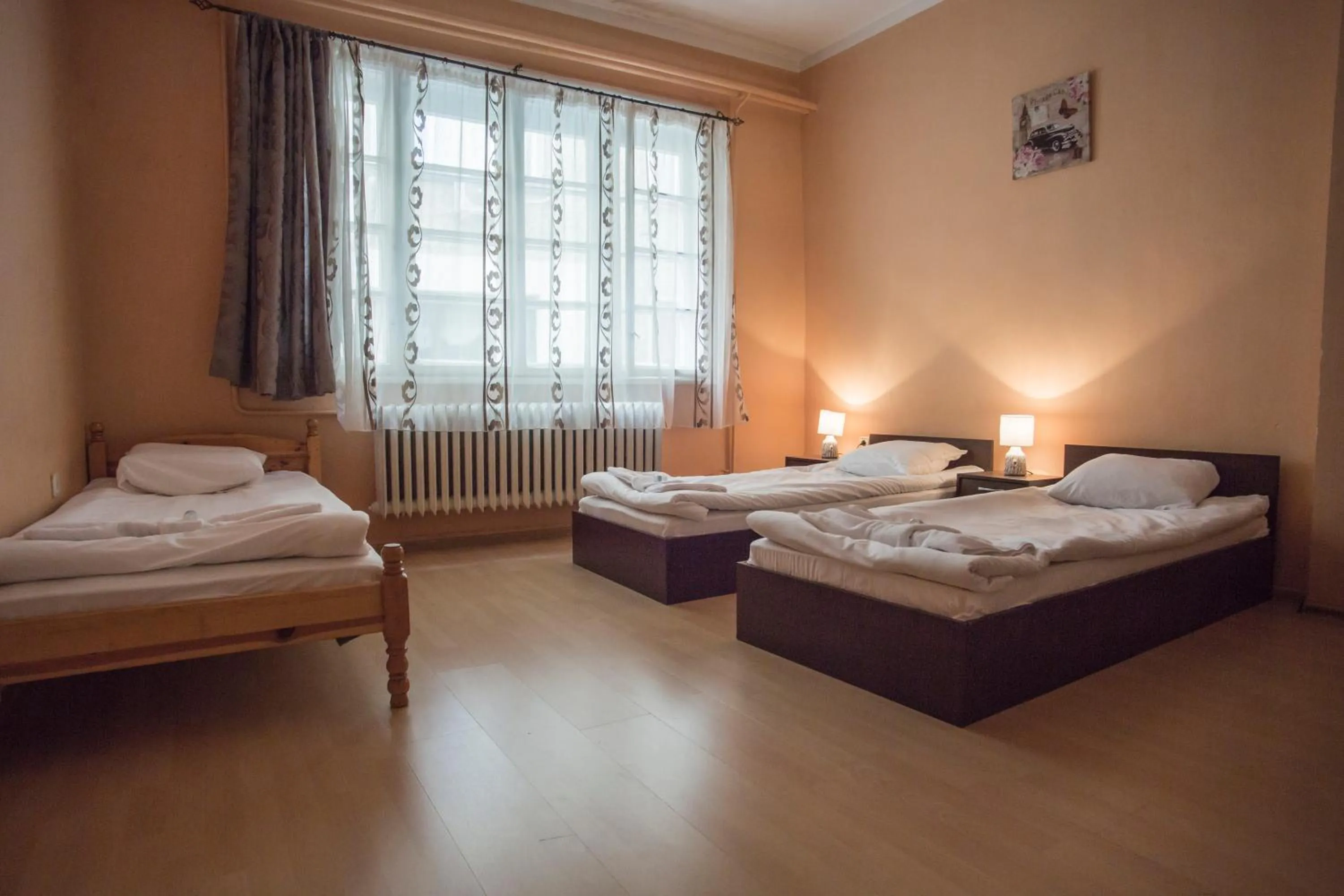 Seating area, Bed in Serdika Rooms