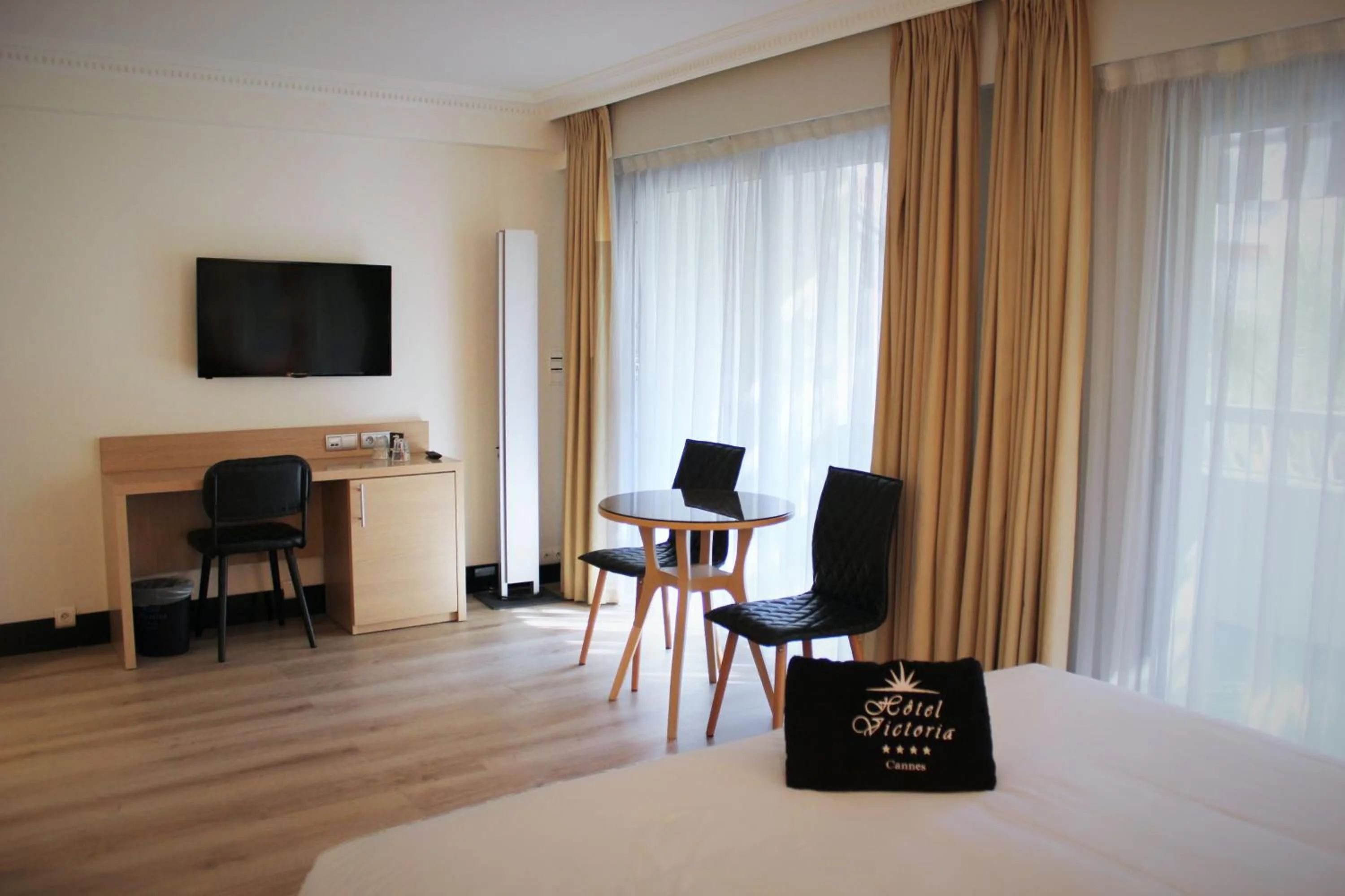 Bedroom in Hôtel Victoria