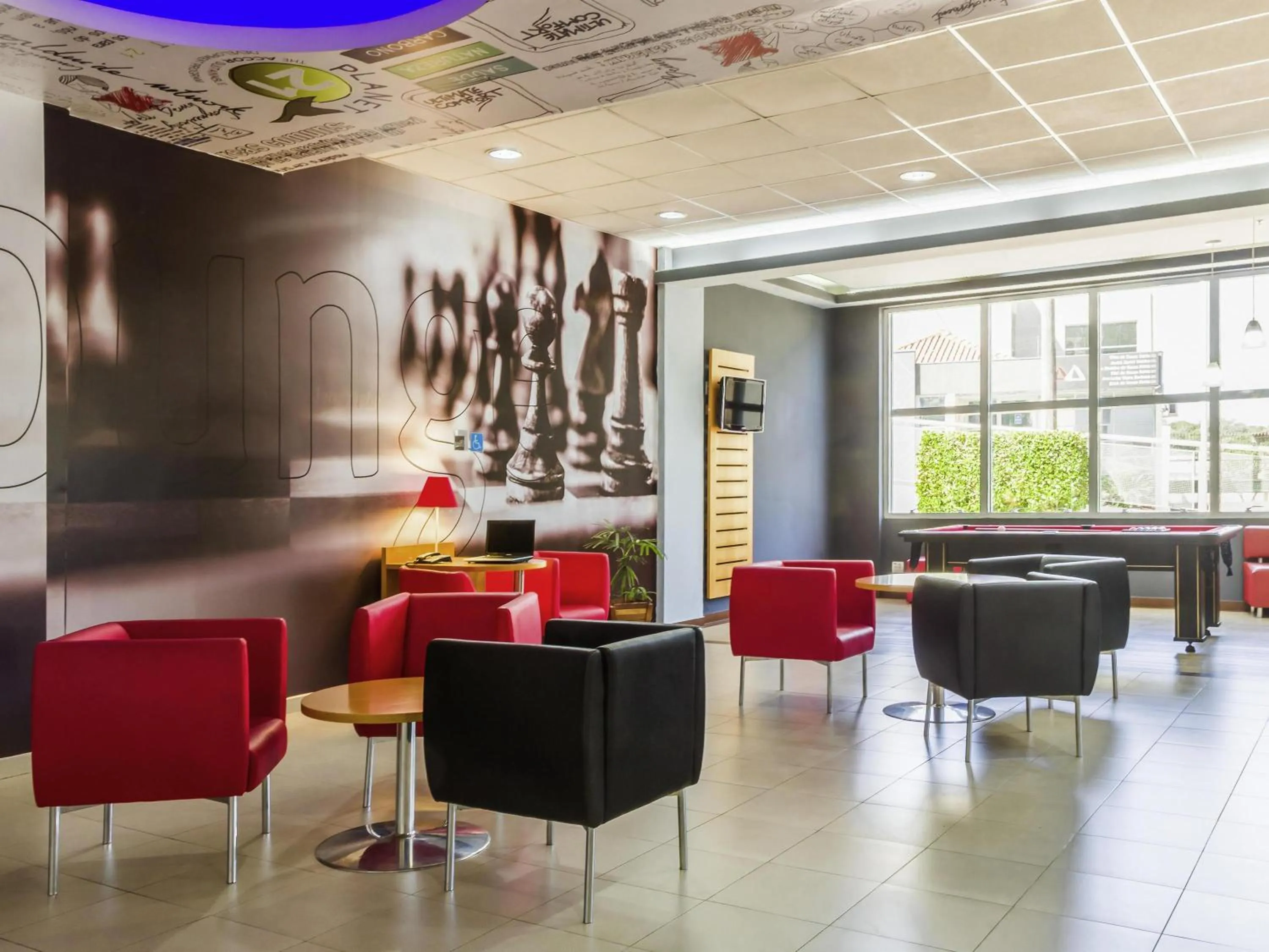 Lounge or bar in ibis Jaboticabal