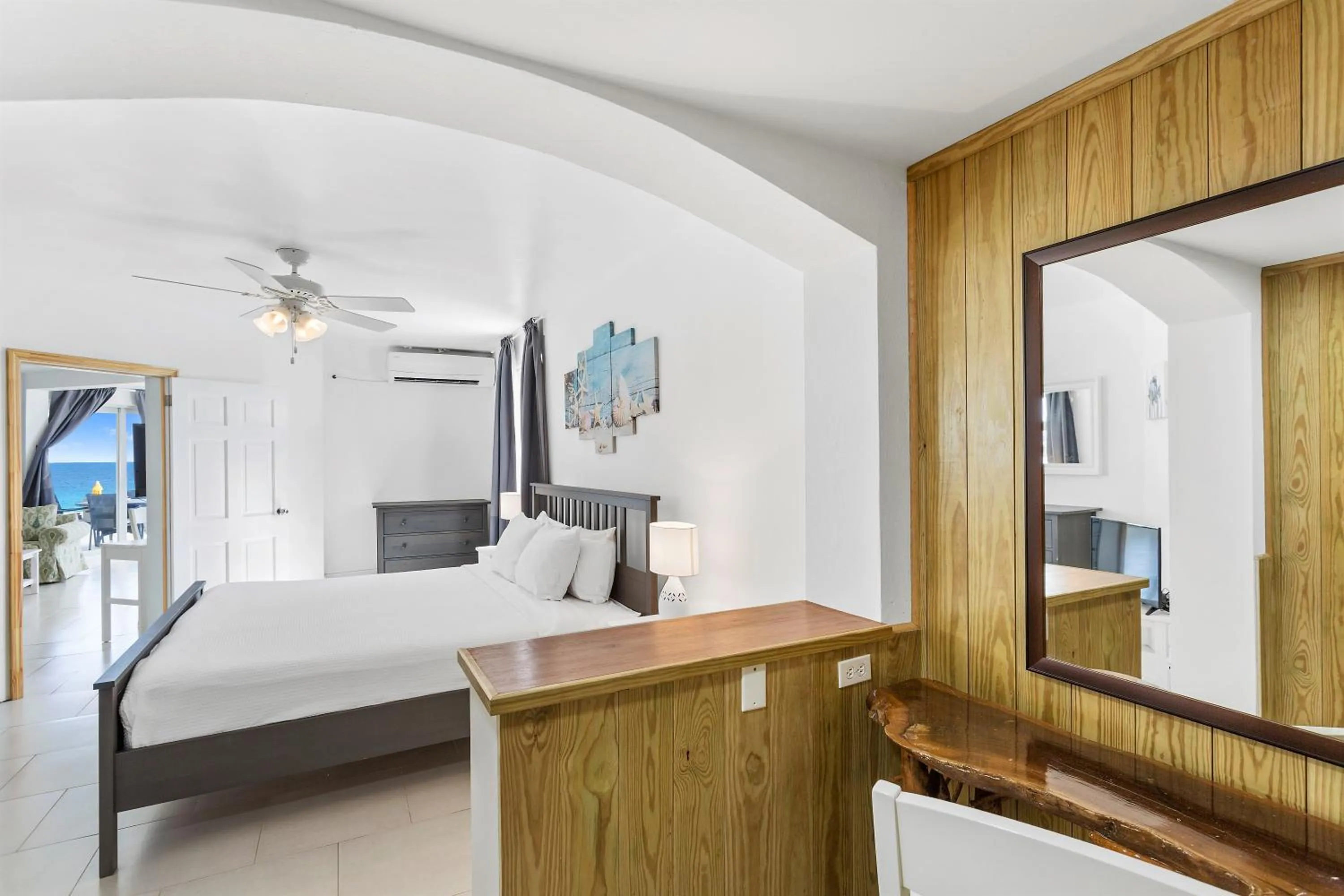 Bed in Turtle's Nest Beach Resort