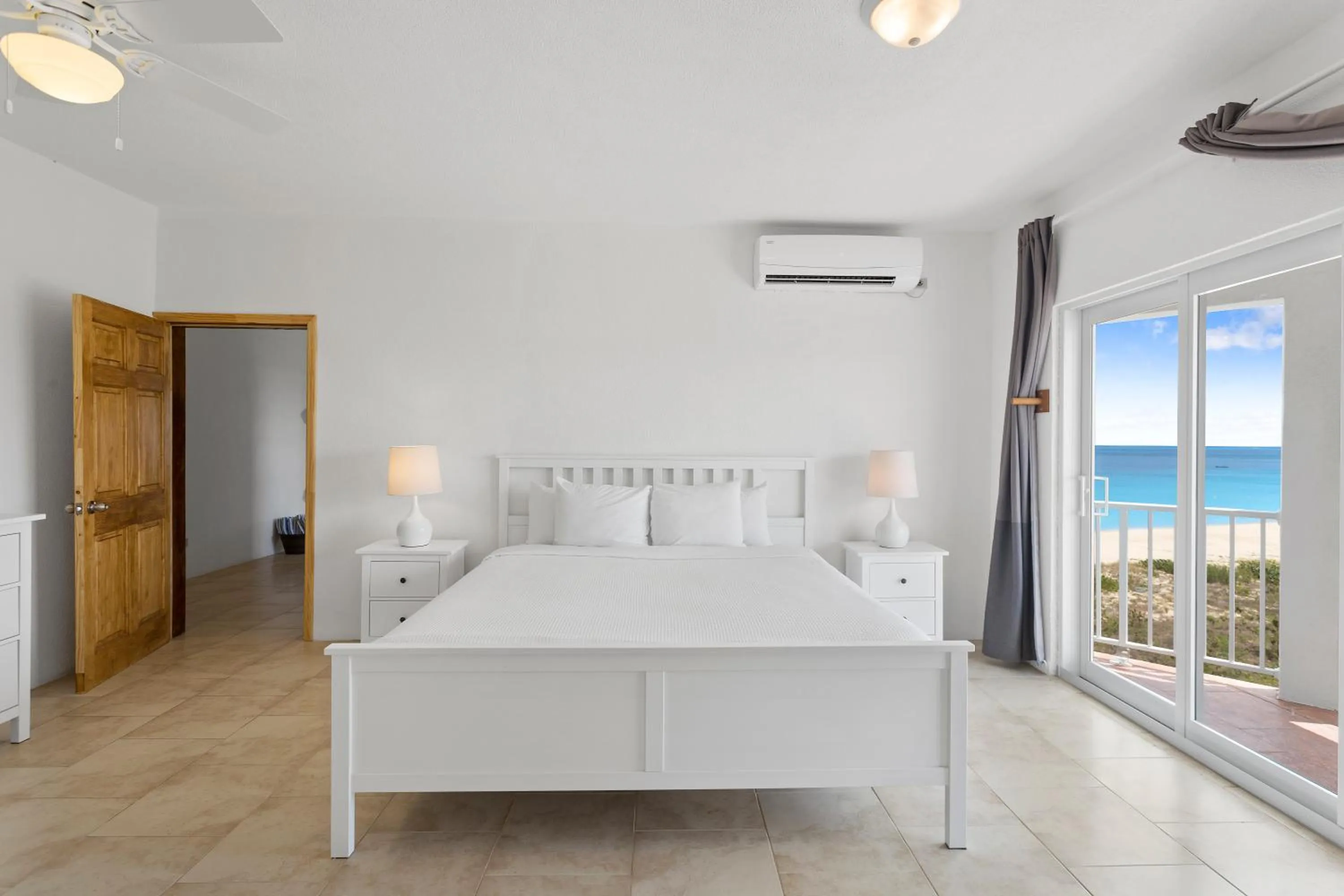 Bed in Turtle's Nest Beach Resort