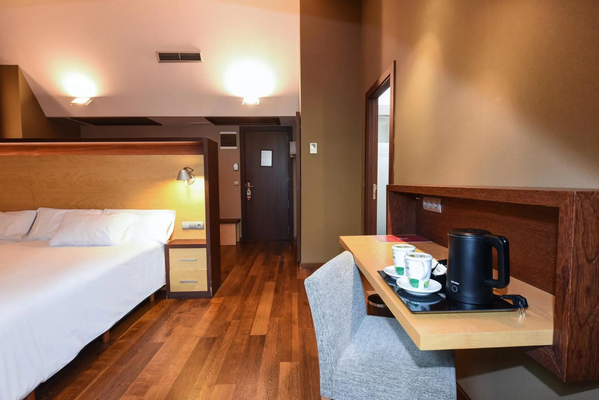 Bed in SOMMOS Hotel Aneto