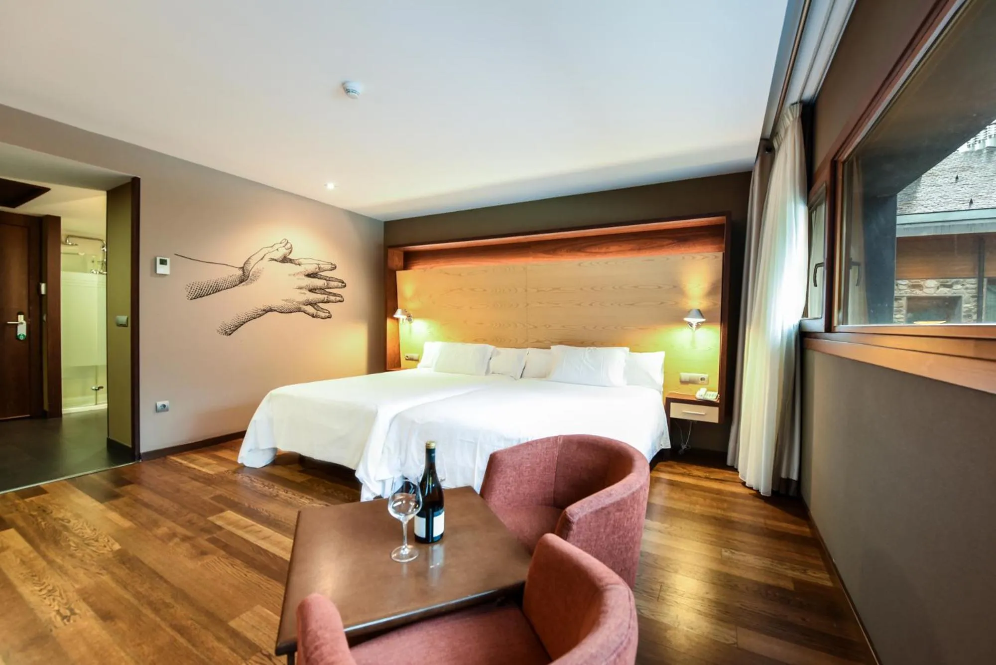 Bed in SOMMOS Hotel Aneto