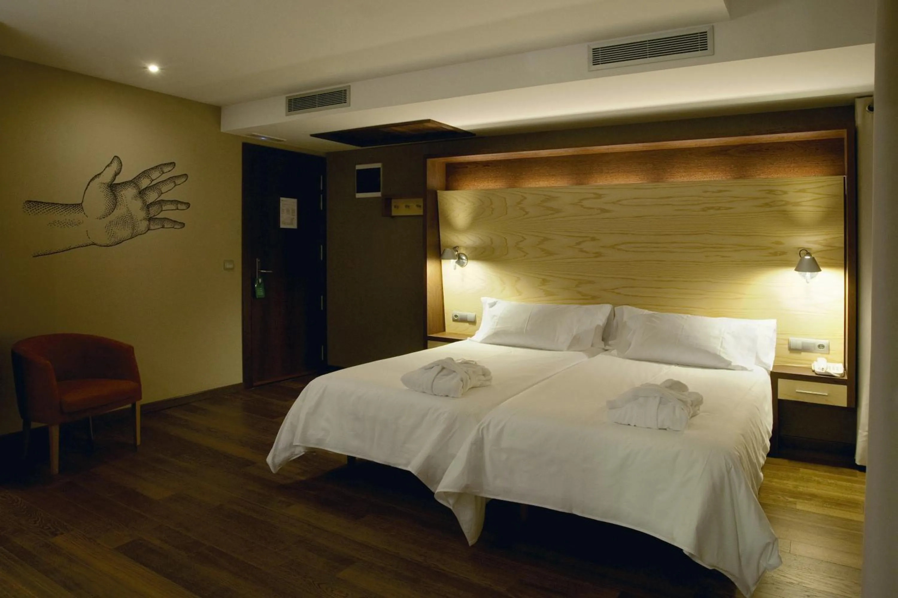 Bed in SOMMOS Hotel Aneto