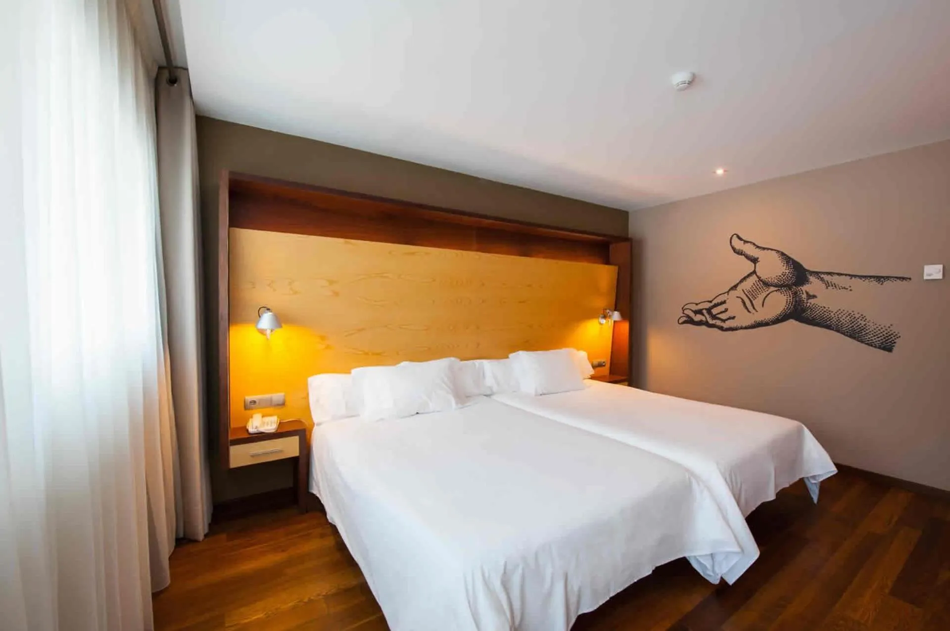 Bed in SOMMOS Hotel Aneto