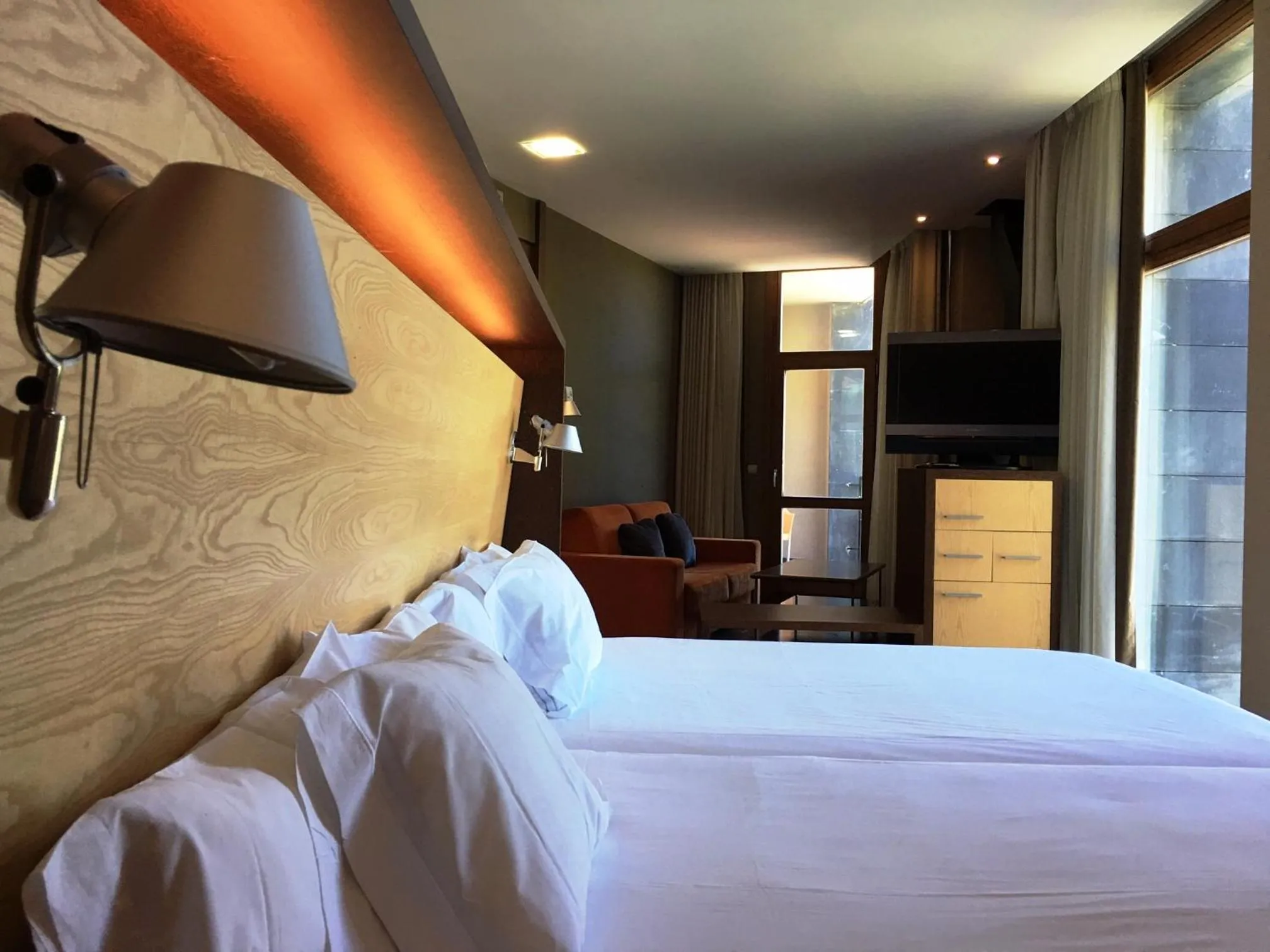 Bed in SOMMOS Hotel Aneto