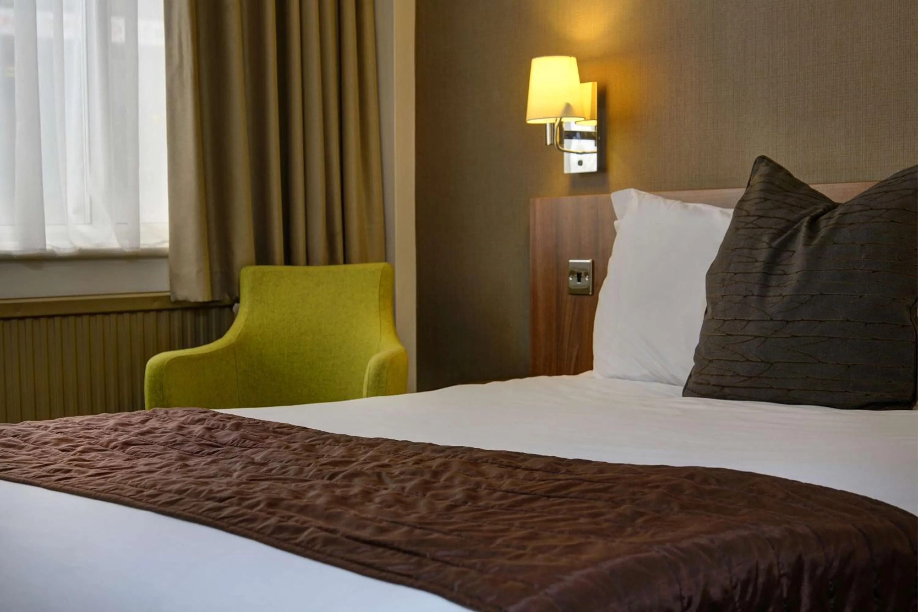 Bedroom in Cresta Court Hotel