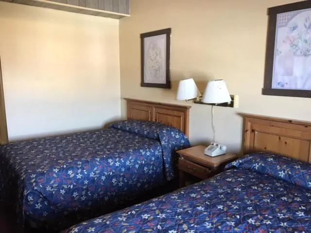 Bedroom, Bed in Relax Inn