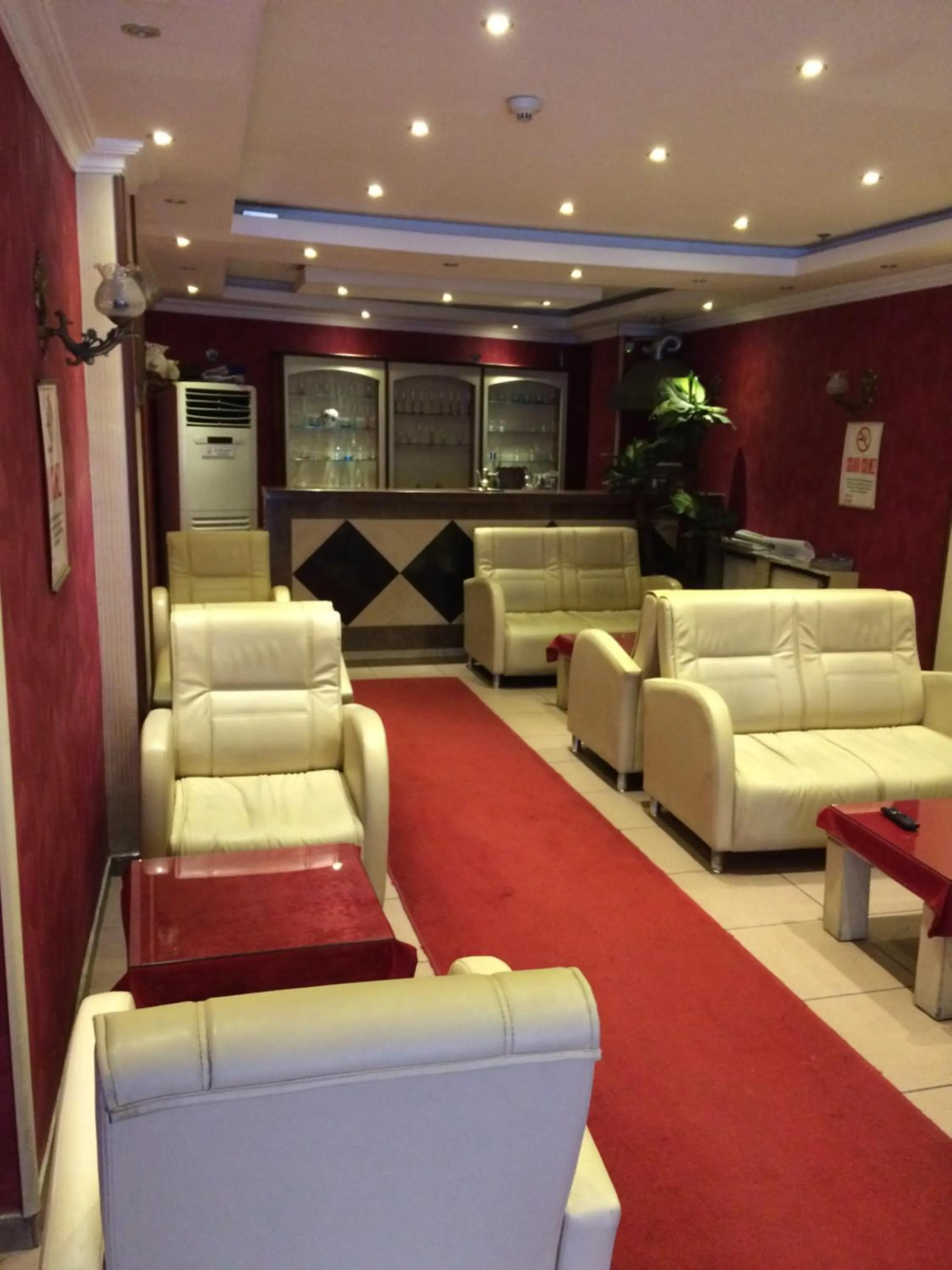 Communal lounge/ TV room in Red White Hotel