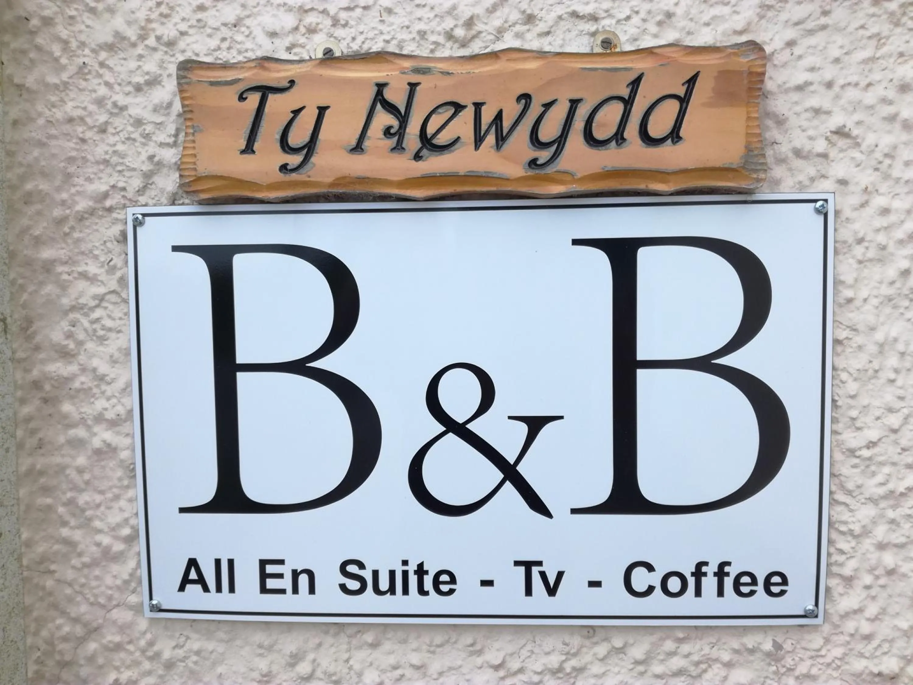Property logo or sign in Ty Newydd