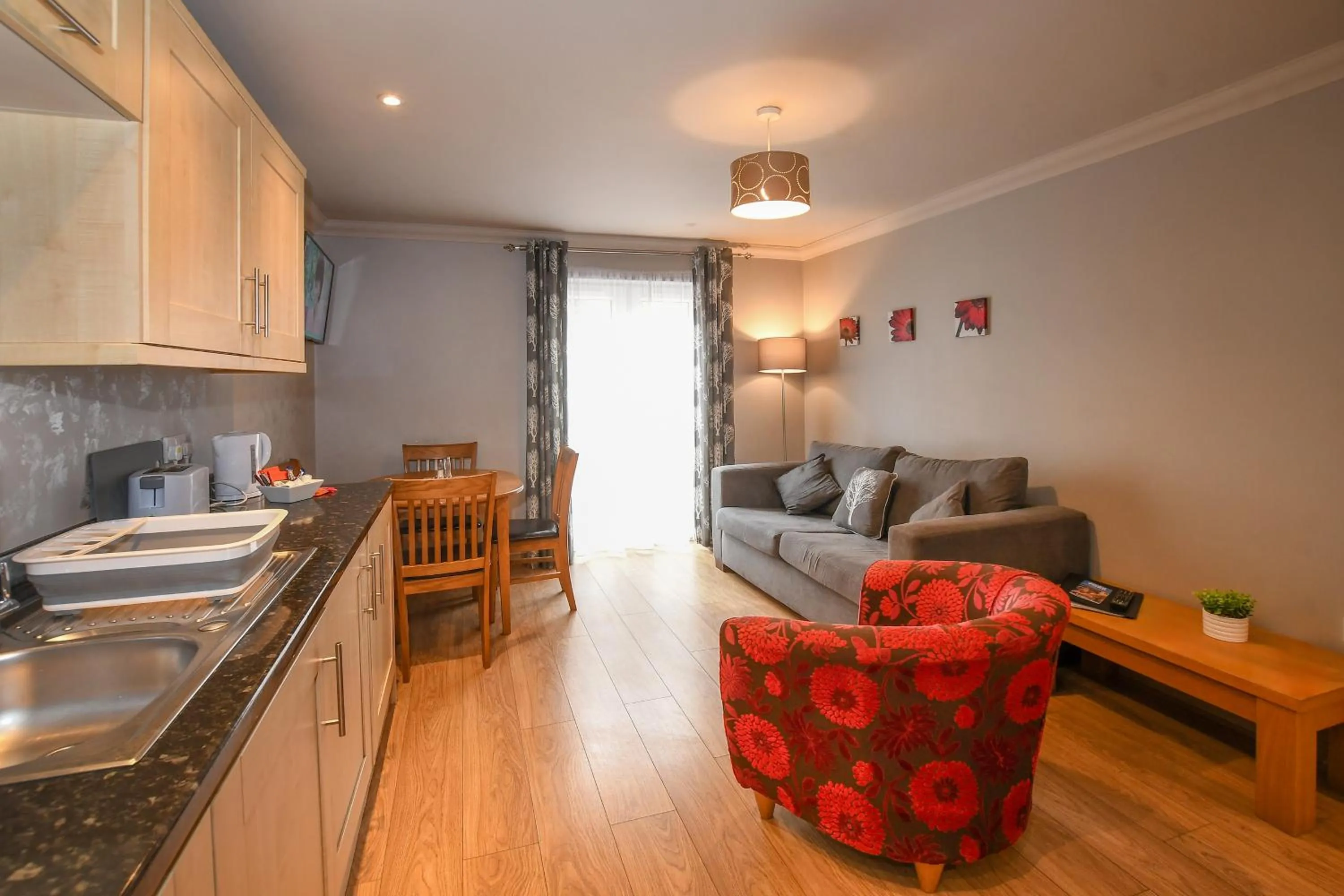 Kitchen or kitchenette in The Queens Hotel & Victoria Cloisters Apartments