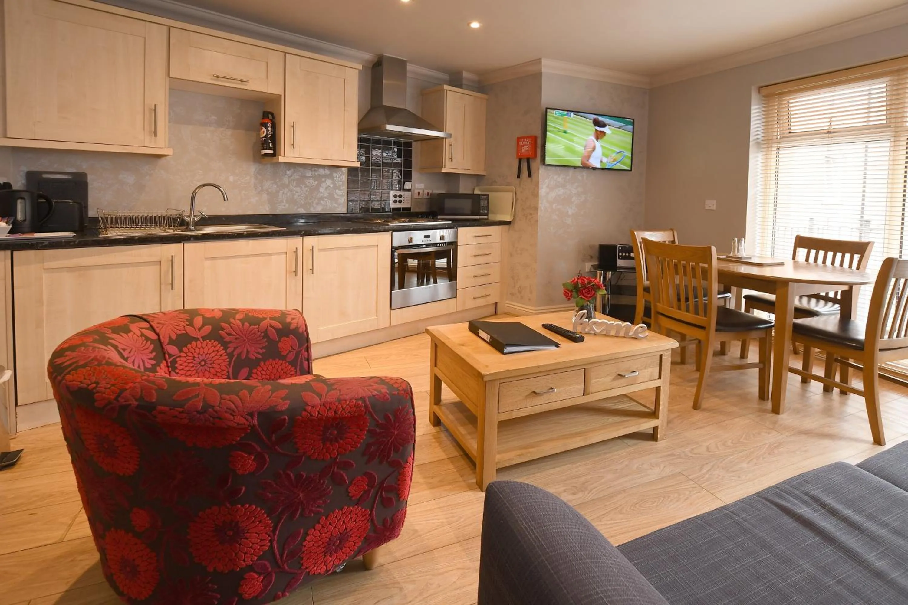 Communal lounge/ TV room in The Queens Hotel & Victoria Cloisters Apartments