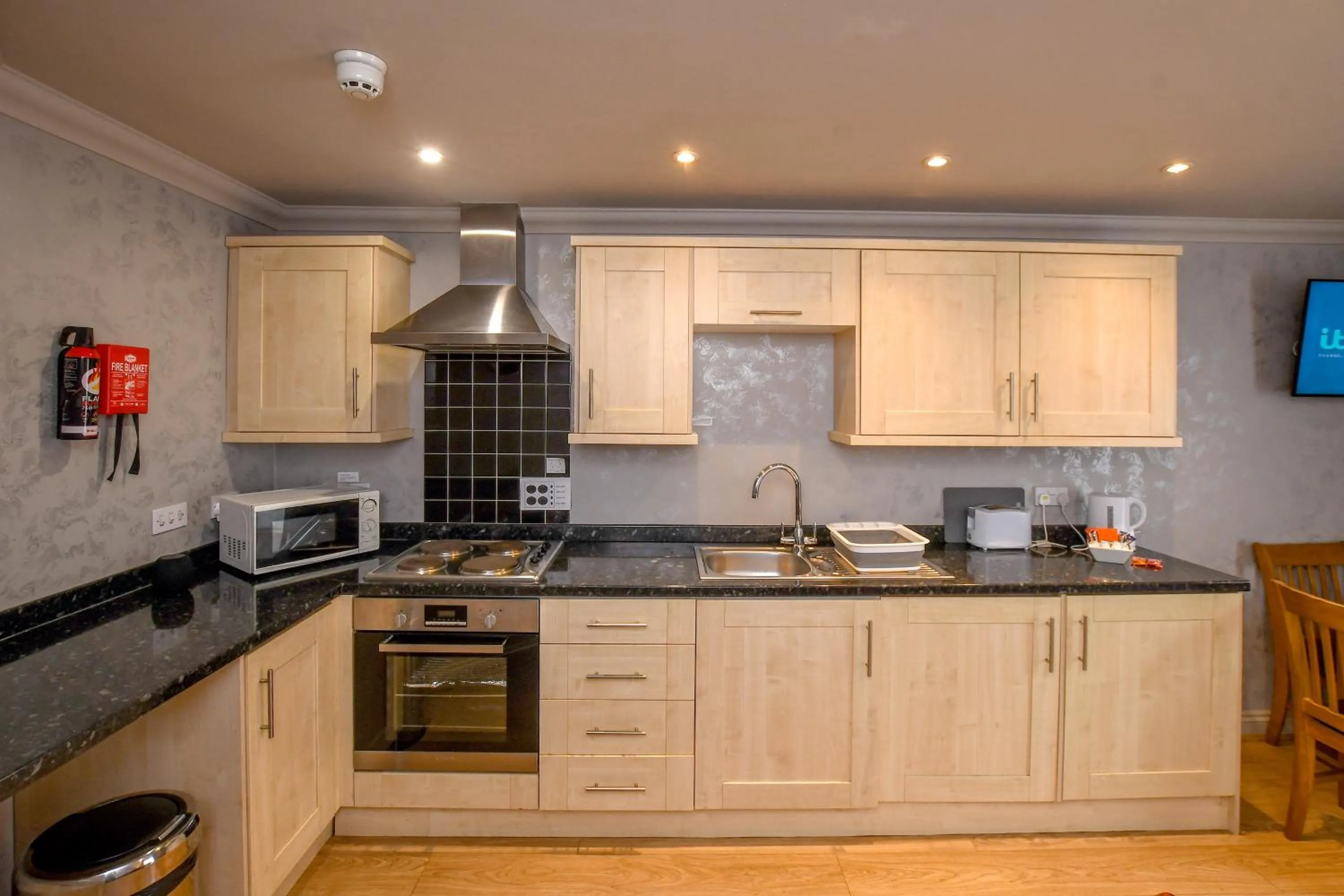 Kitchen or kitchenette in The Queens Hotel & Victoria Cloisters Apartments