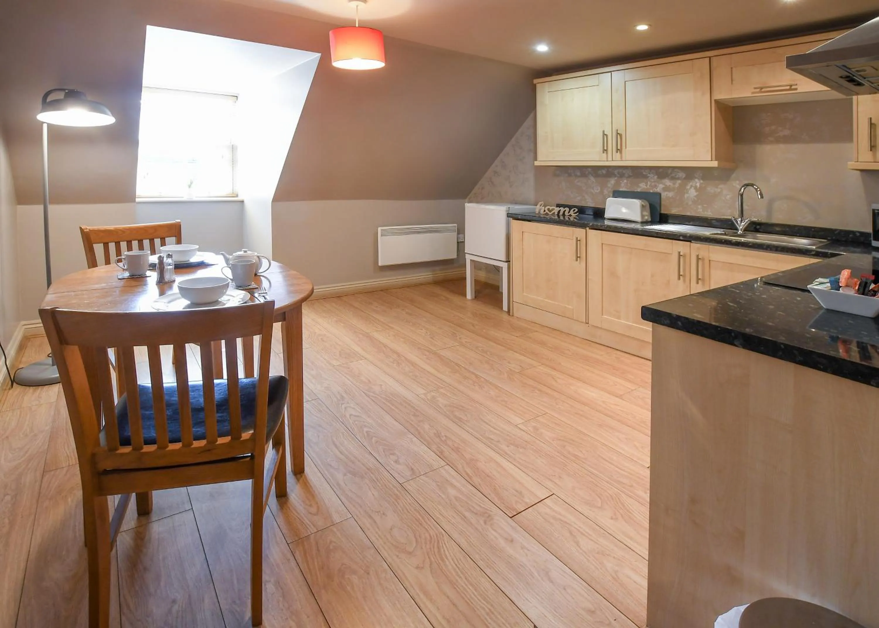 Kitchen or kitchenette in The Queens Hotel & Victoria Cloisters Apartments