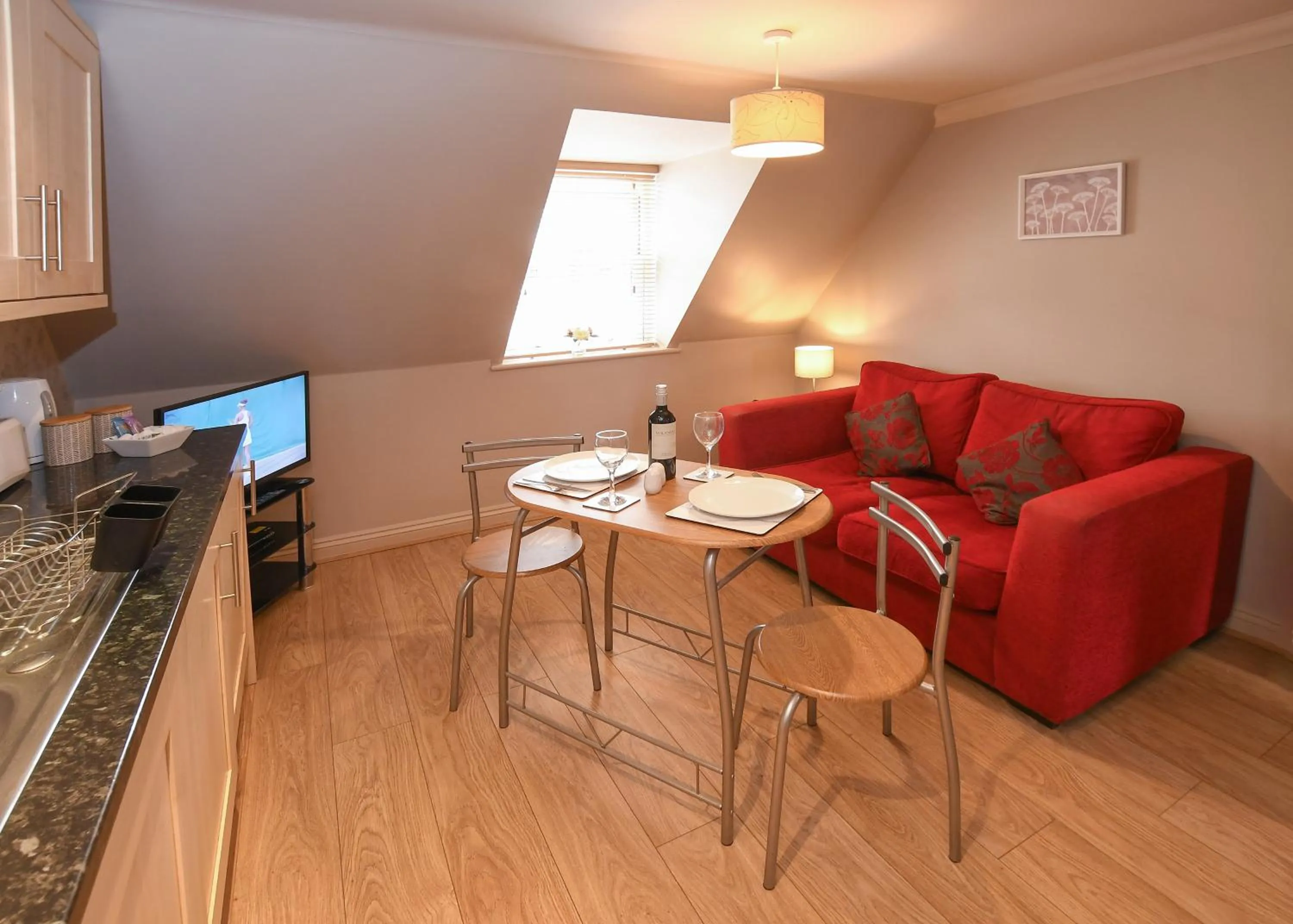 Living room in The Queens Hotel & Victoria Cloisters Apartments