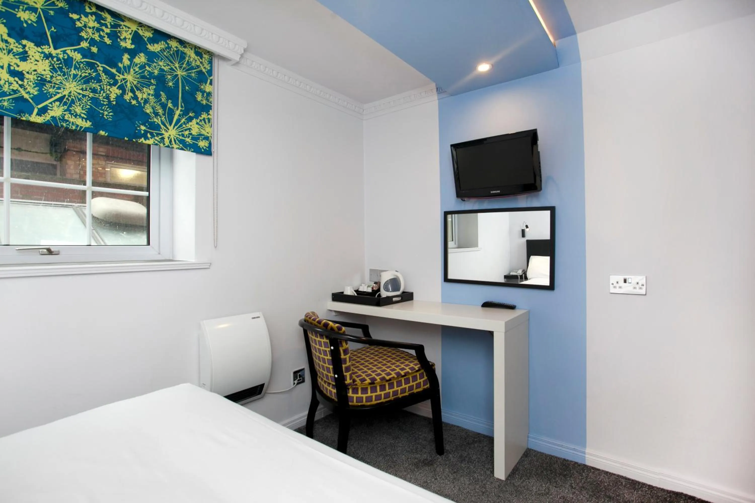 Seating area, Bed in St James Hotel; BW Premier Collection