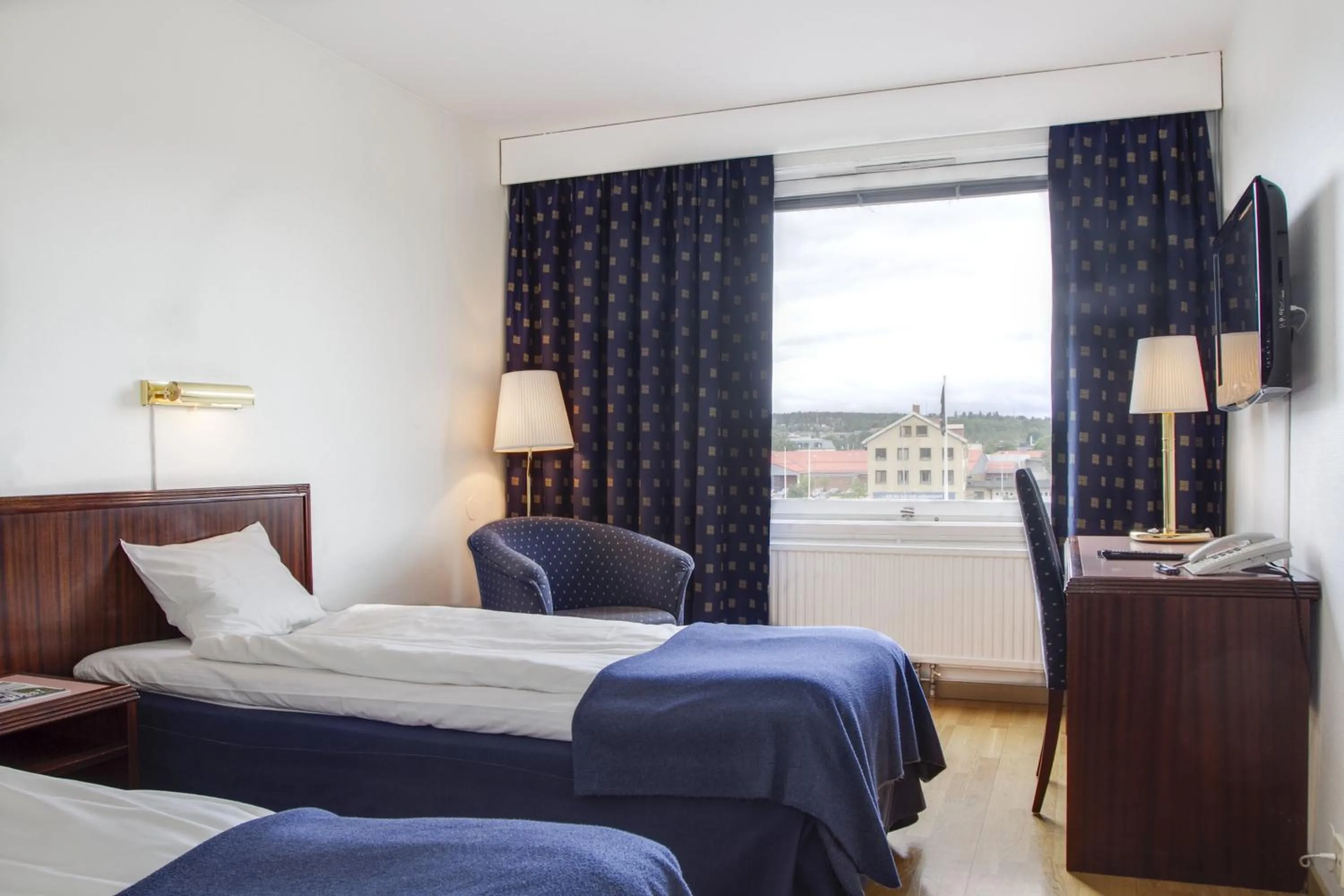 Bed in First Hotel Stadt