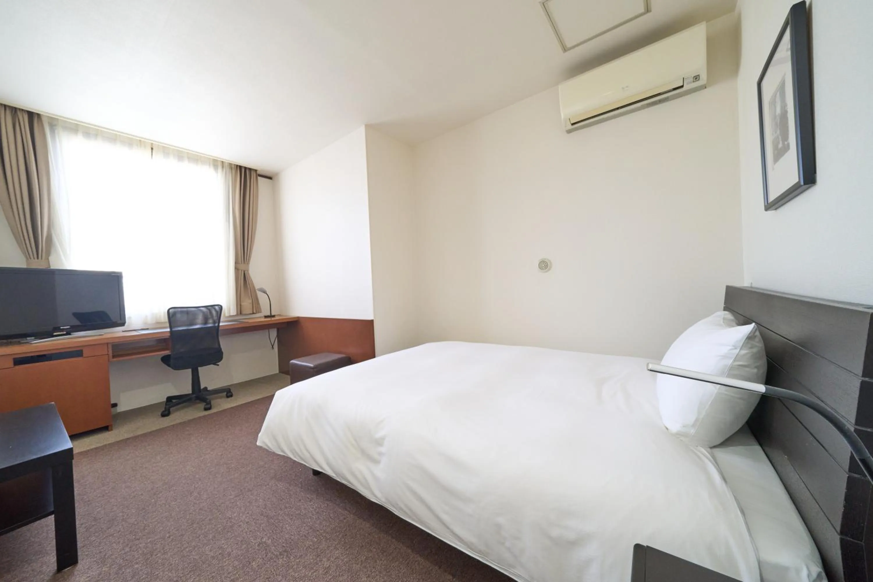 Photo of the whole room, Bed in Hotel Tohkai