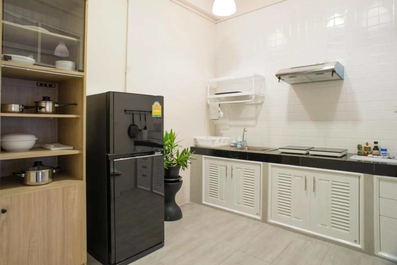 Kitchen or kitchenette in Neveu Premier Residence : Ratchada