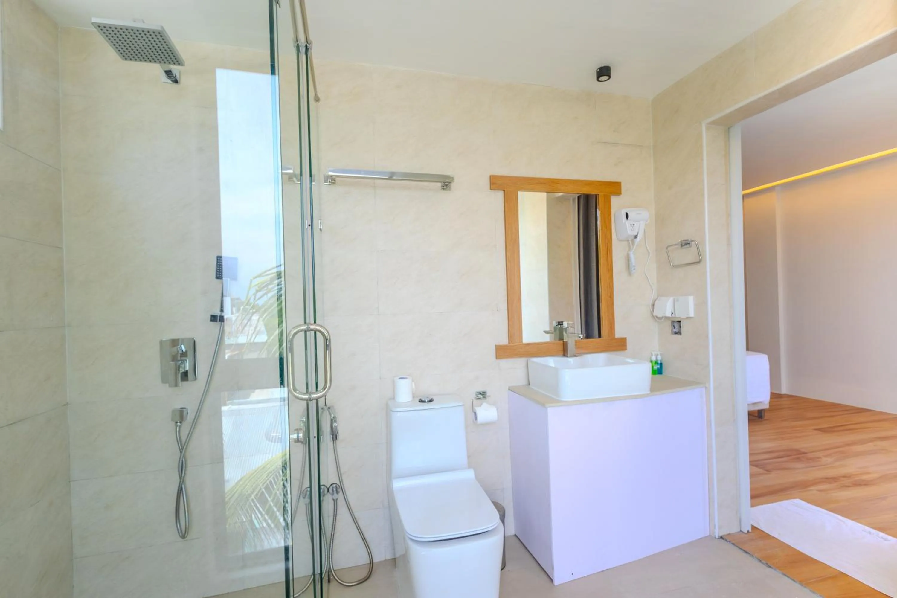 Shower in Shallow Lagoon Rasdhoo