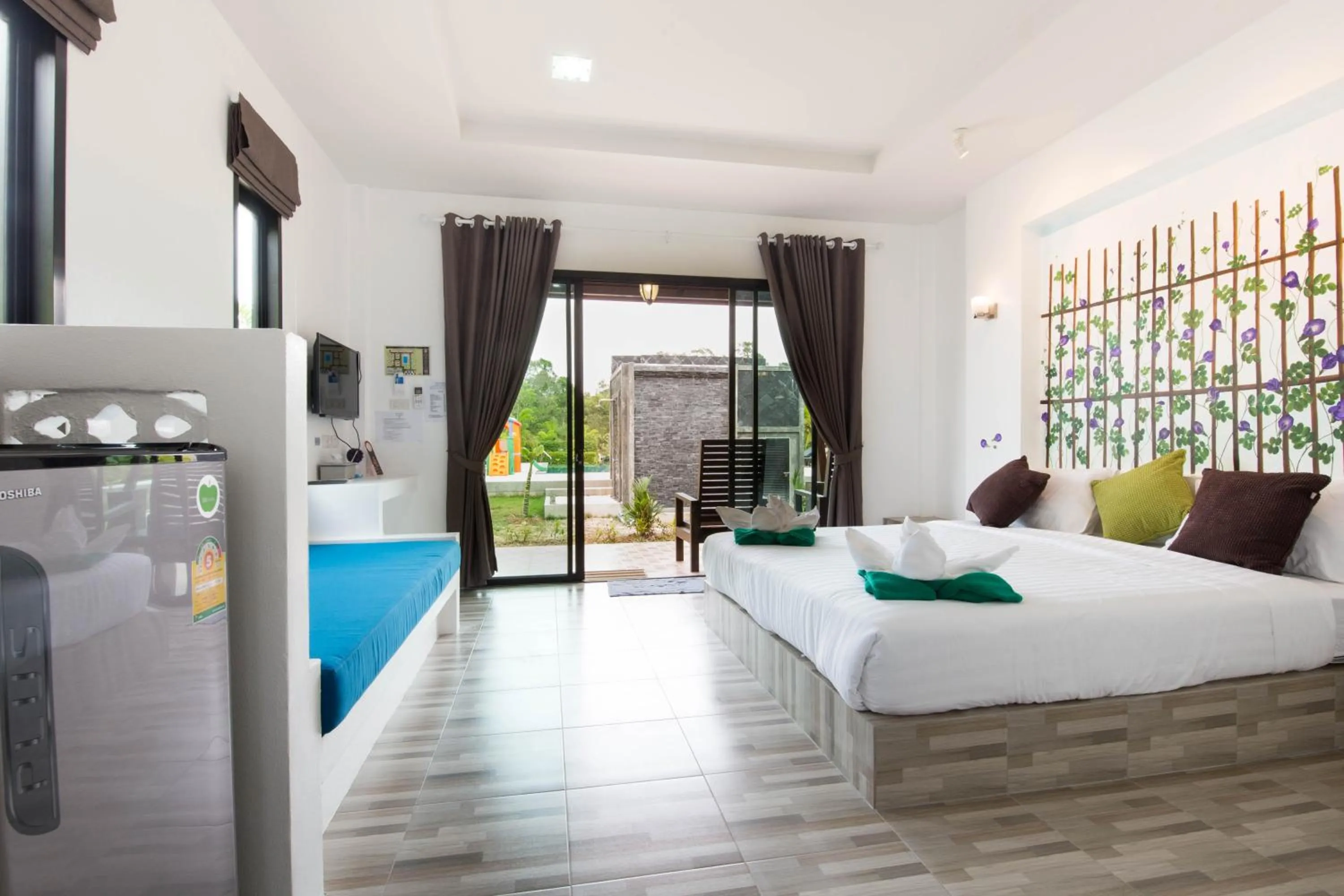 Bed in Siri Lanta Resort