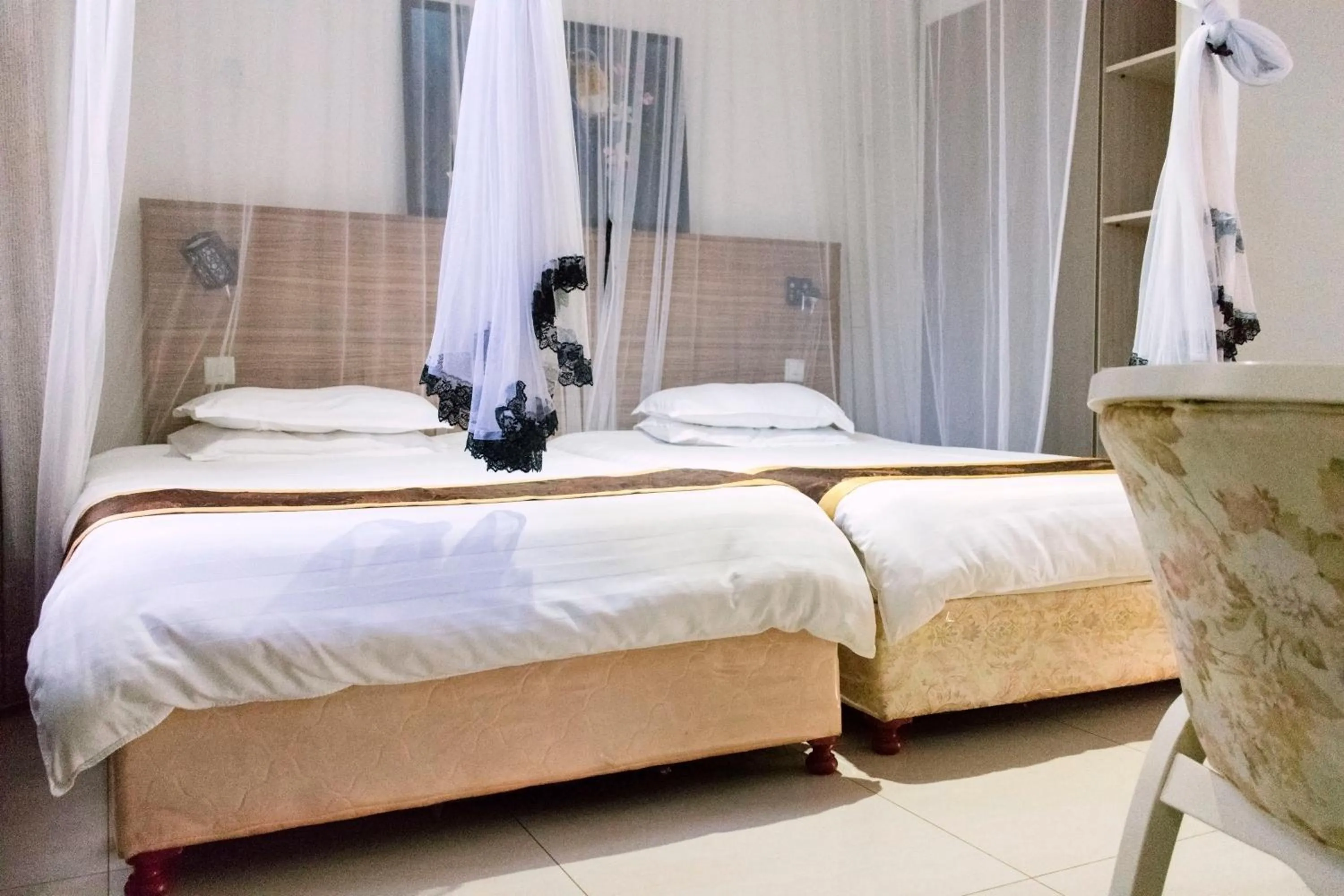 Bed in Remmings Hotel Kampala