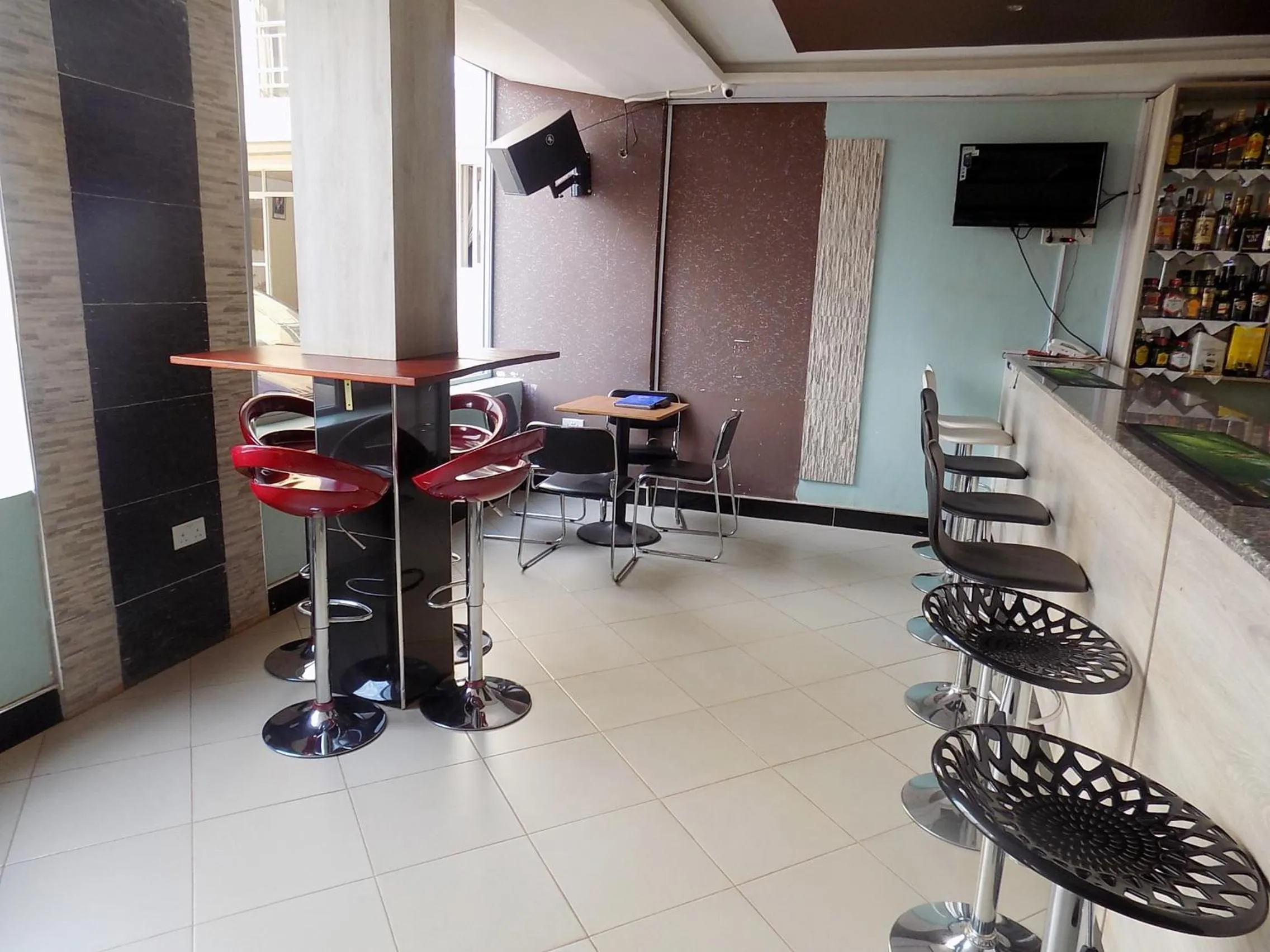Lounge or bar in Remmings Hotel Kampala