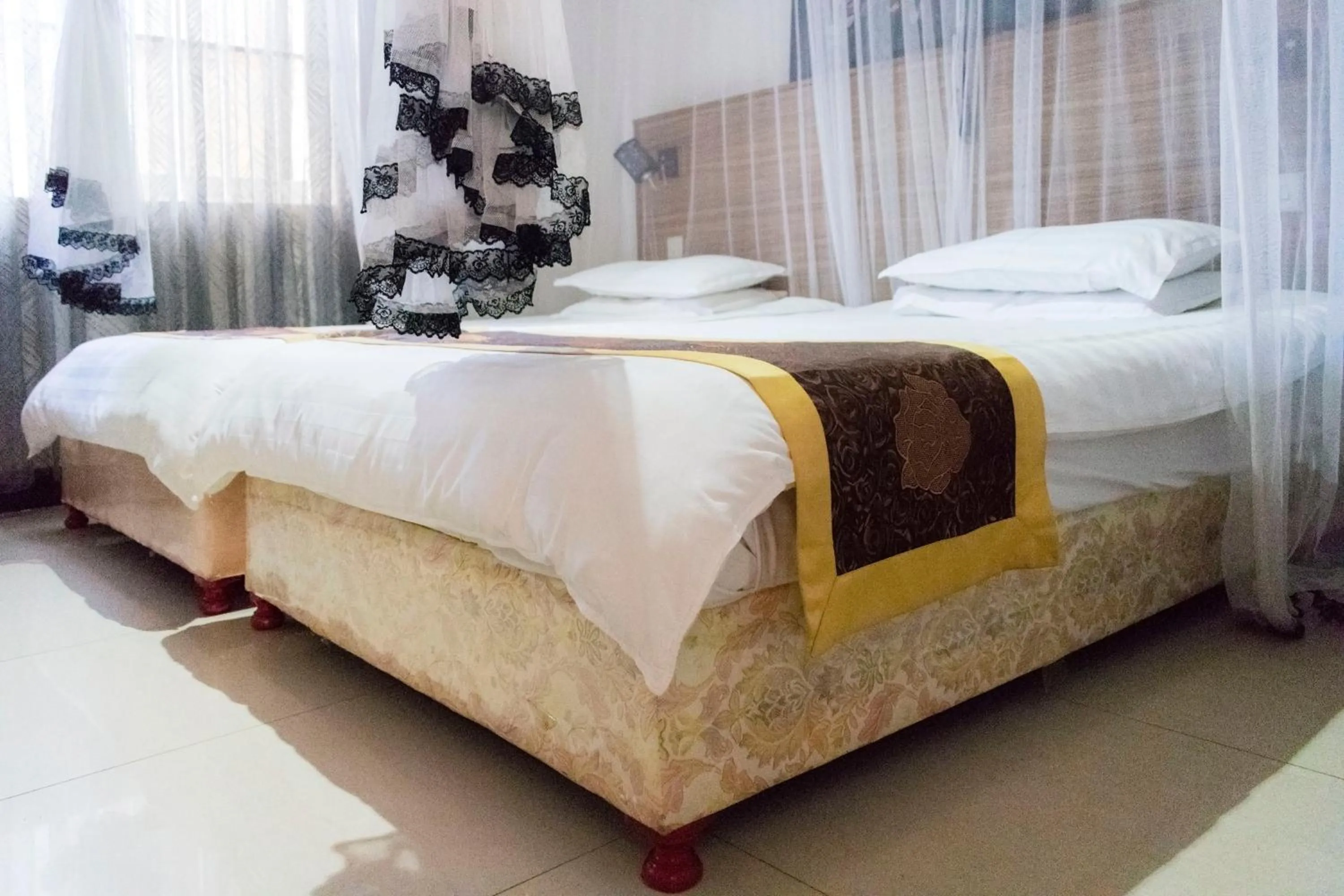 Bed in Remmings Hotel Kampala