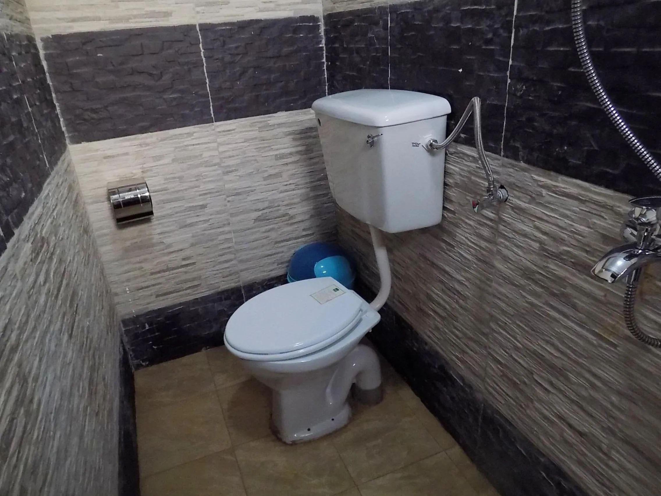 Bathroom in Remmings Hotel Kampala