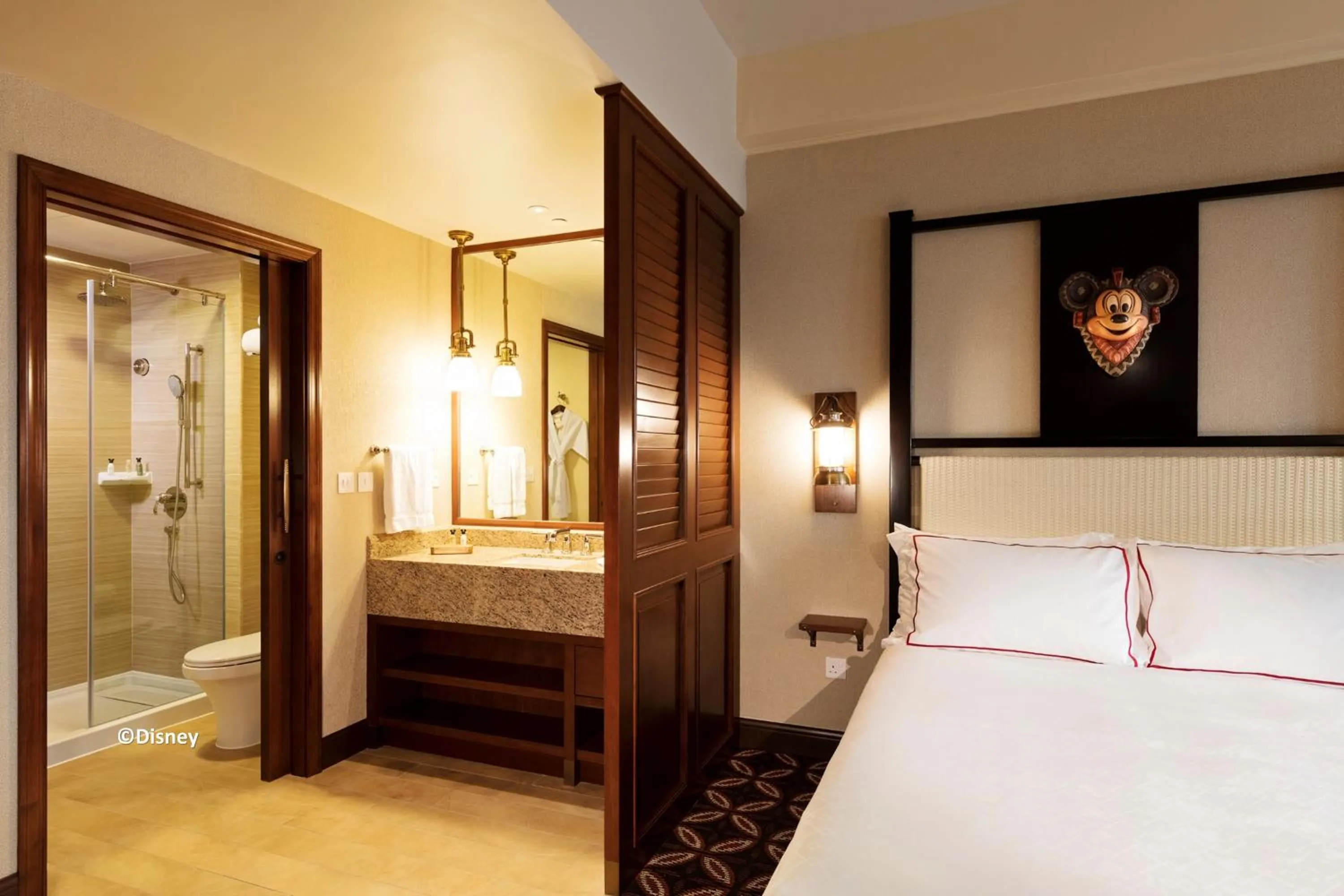 Bathroom, Bed in Disney Explorers Lodge