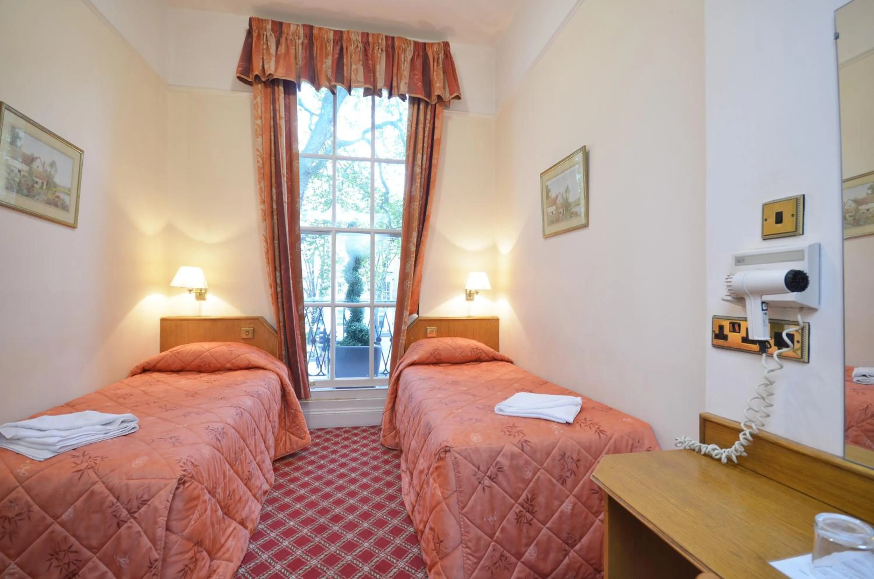 Bed in Seymour Hotel