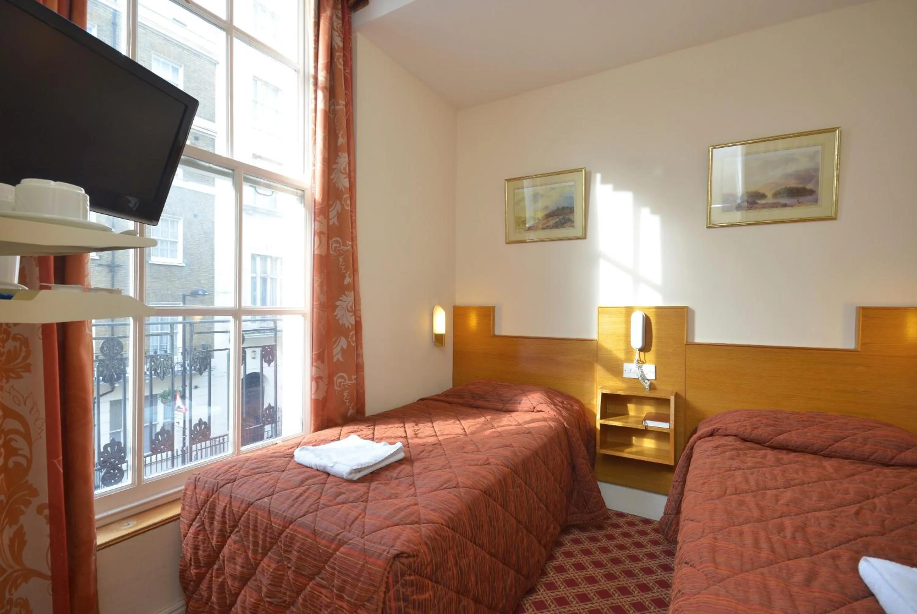 Bed in Seymour Hotel