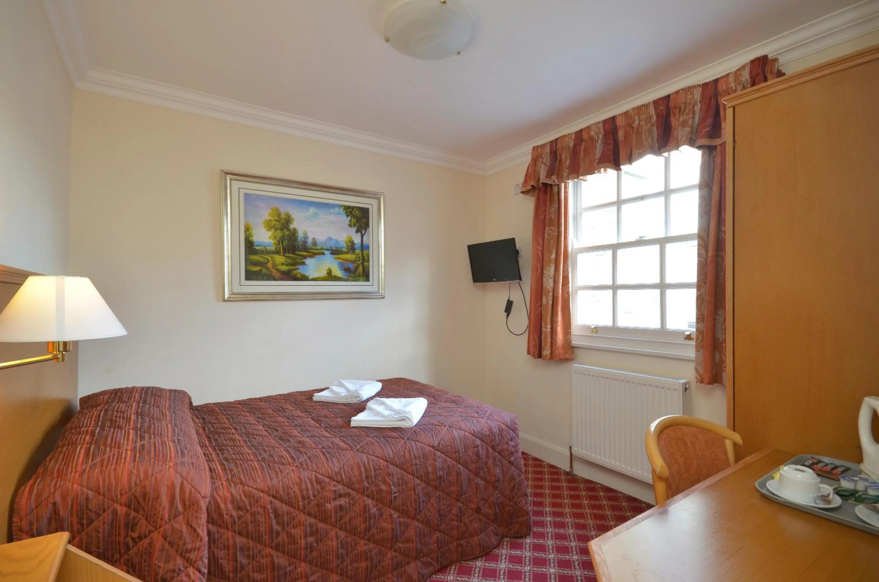 Bed in Seymour Hotel