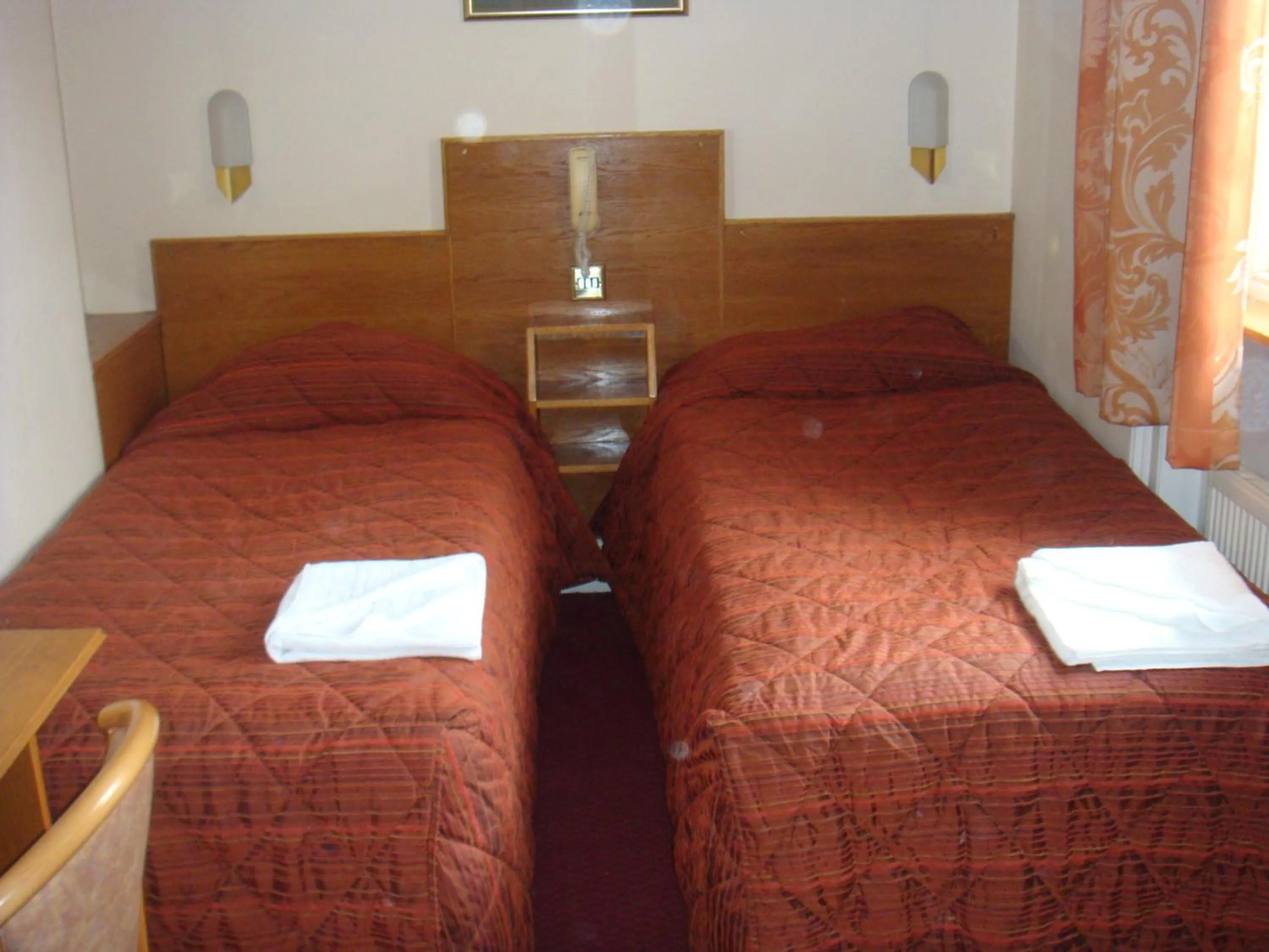 Bed in Seymour Hotel