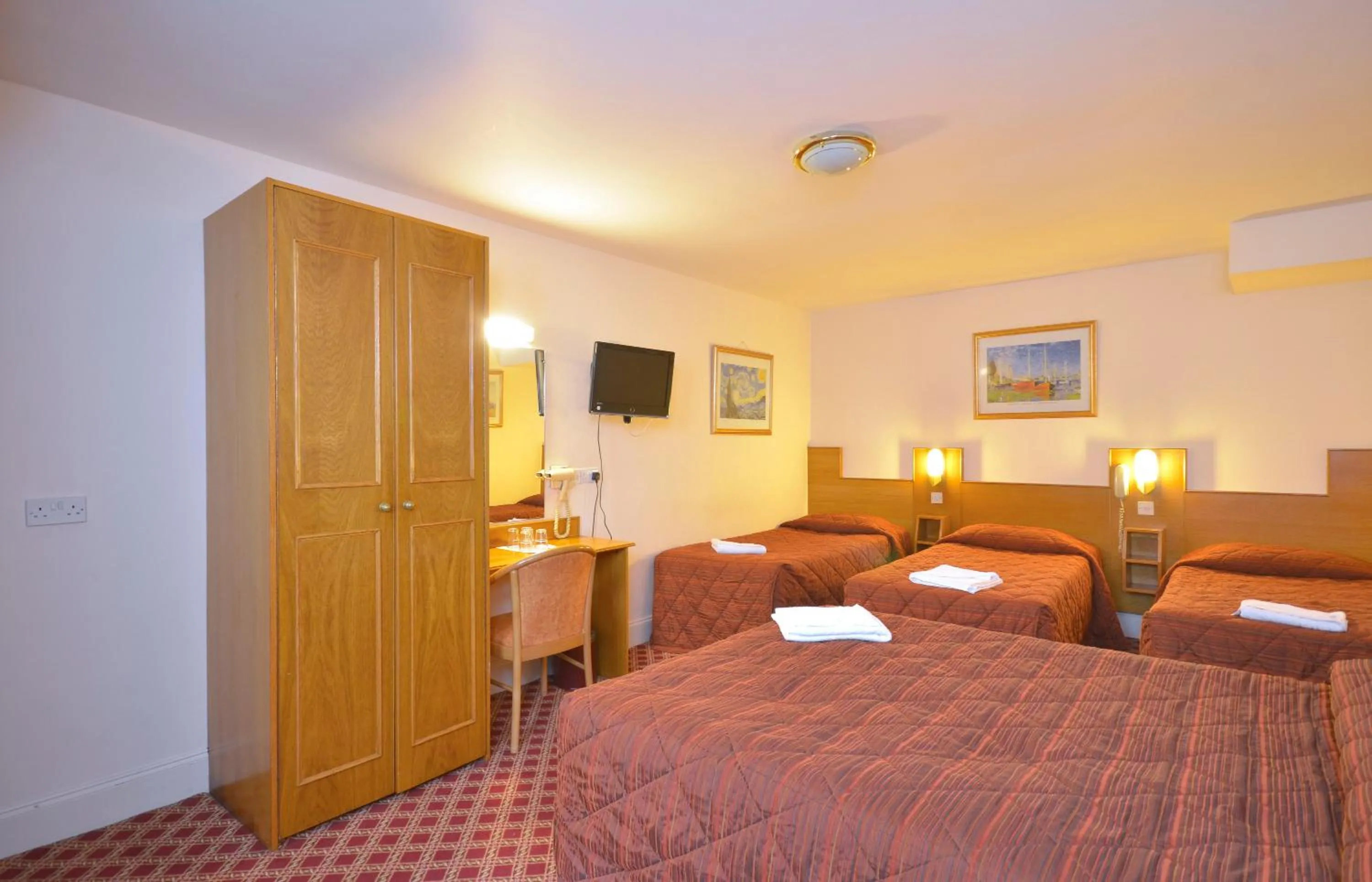 Bed in Seymour Hotel