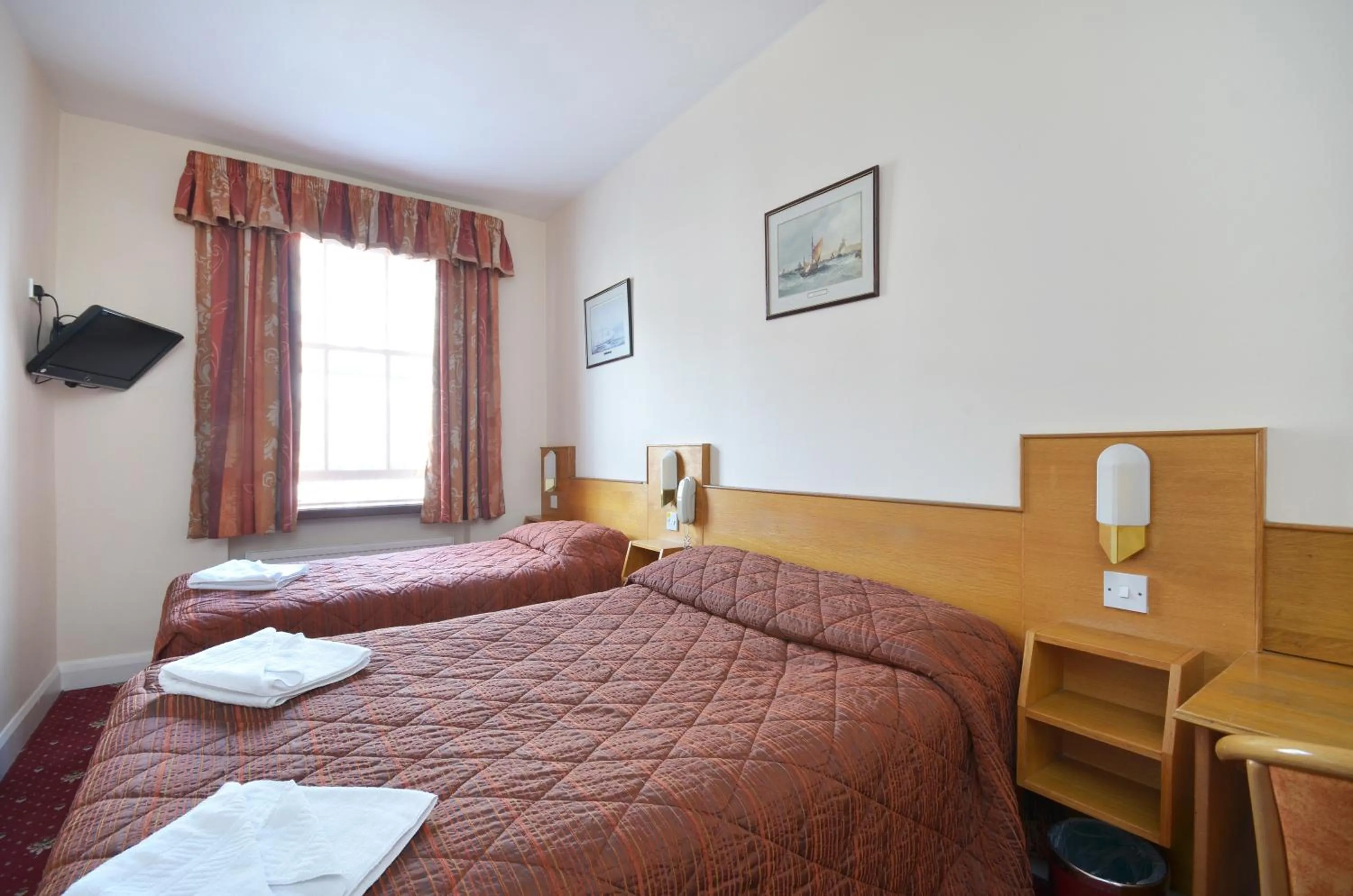 Bed in Seymour Hotel