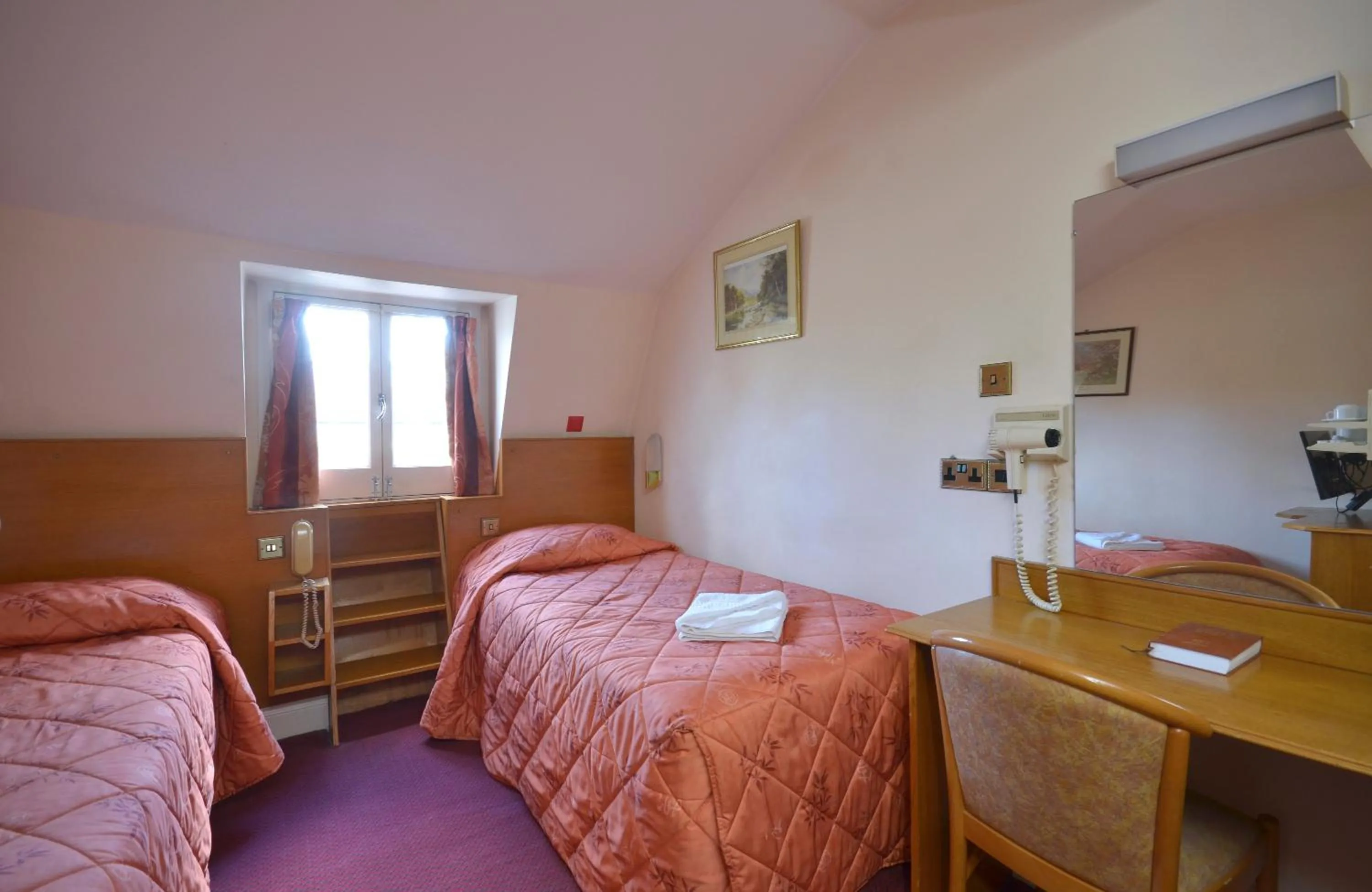 Bed in Seymour Hotel