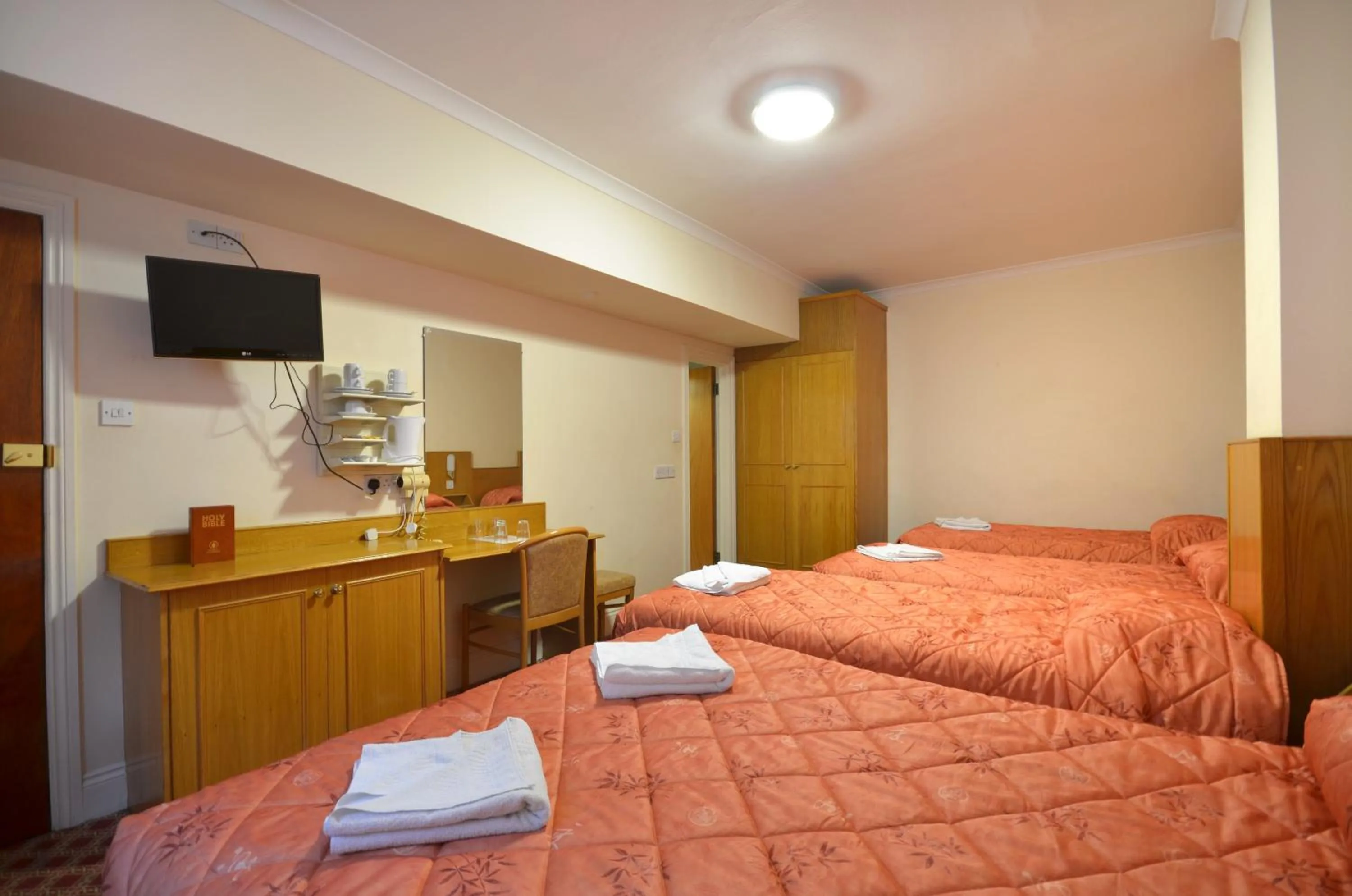 Bed in Seymour Hotel