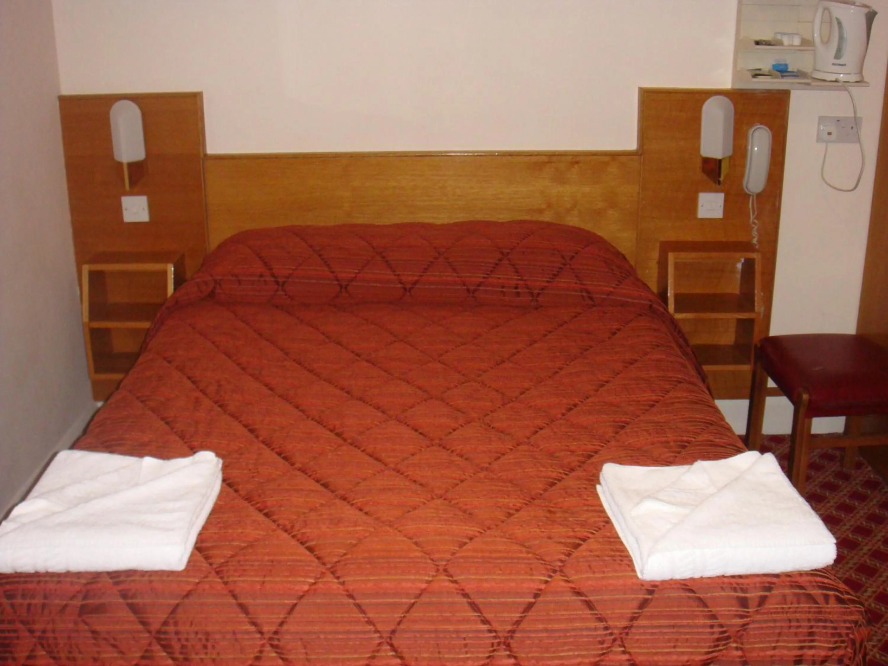 Bed in Seymour Hotel