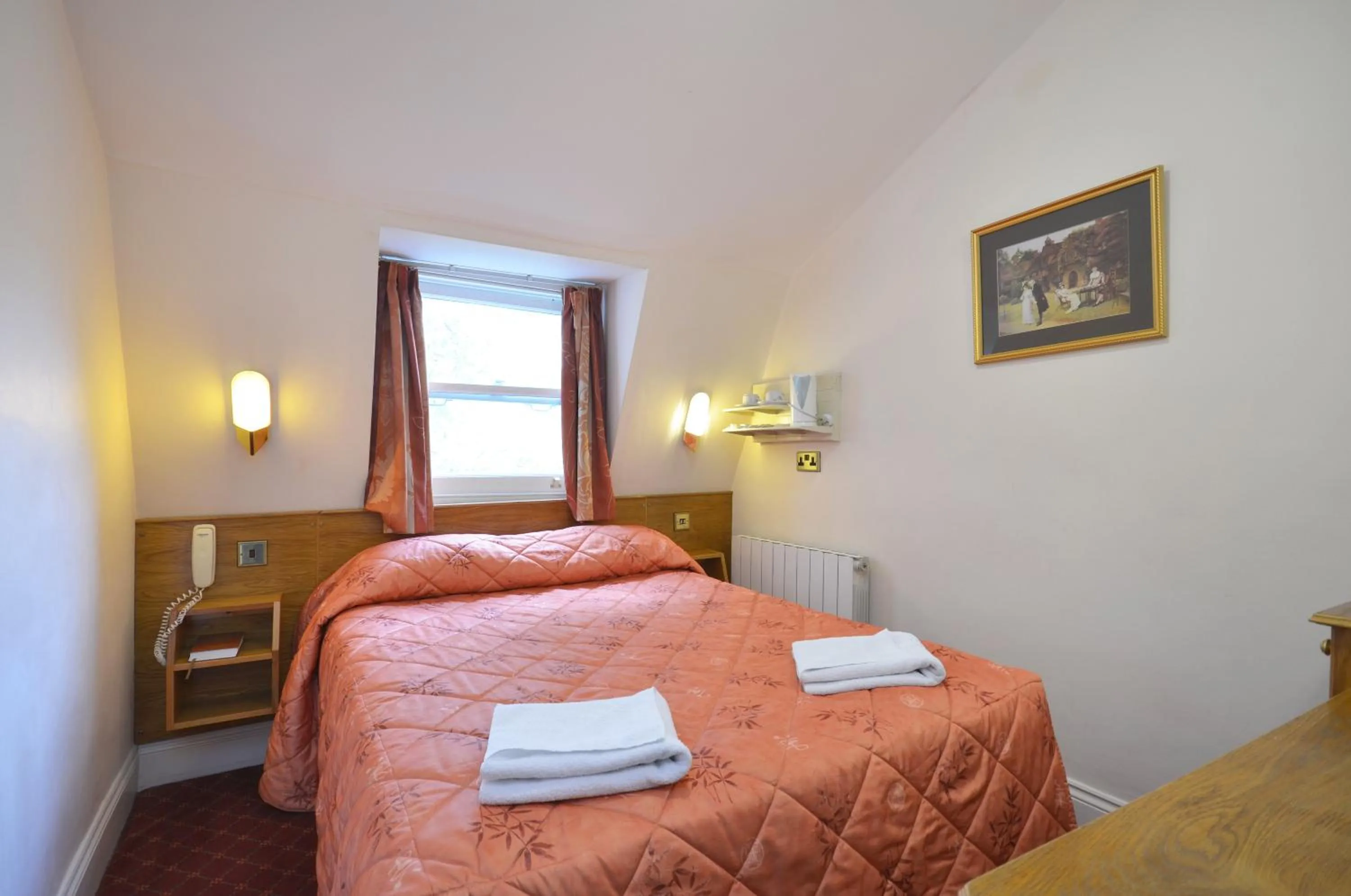 Bed in Seymour Hotel