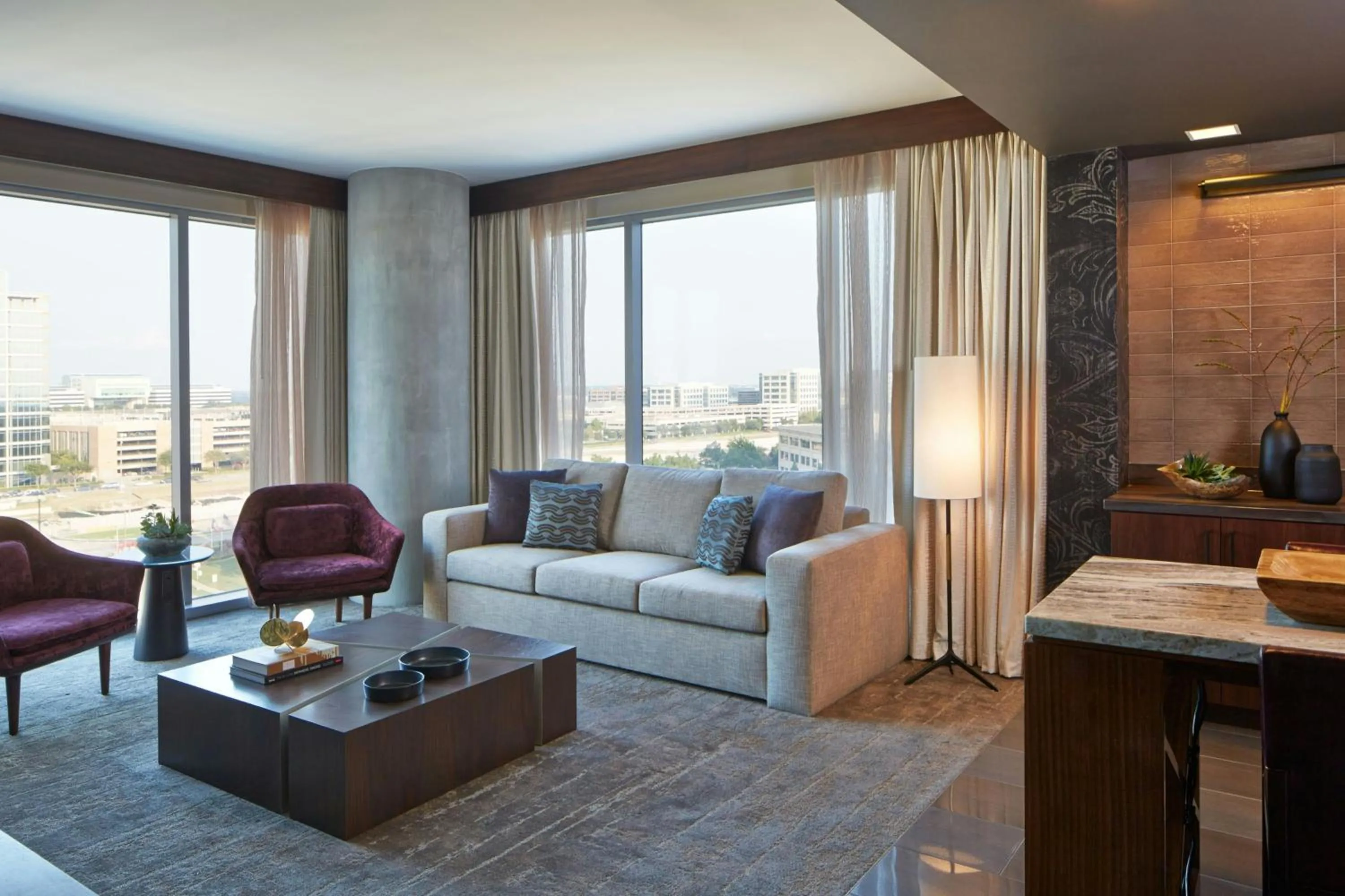 Living room in Renaissance Dallas at Plano Legacy West Hotel