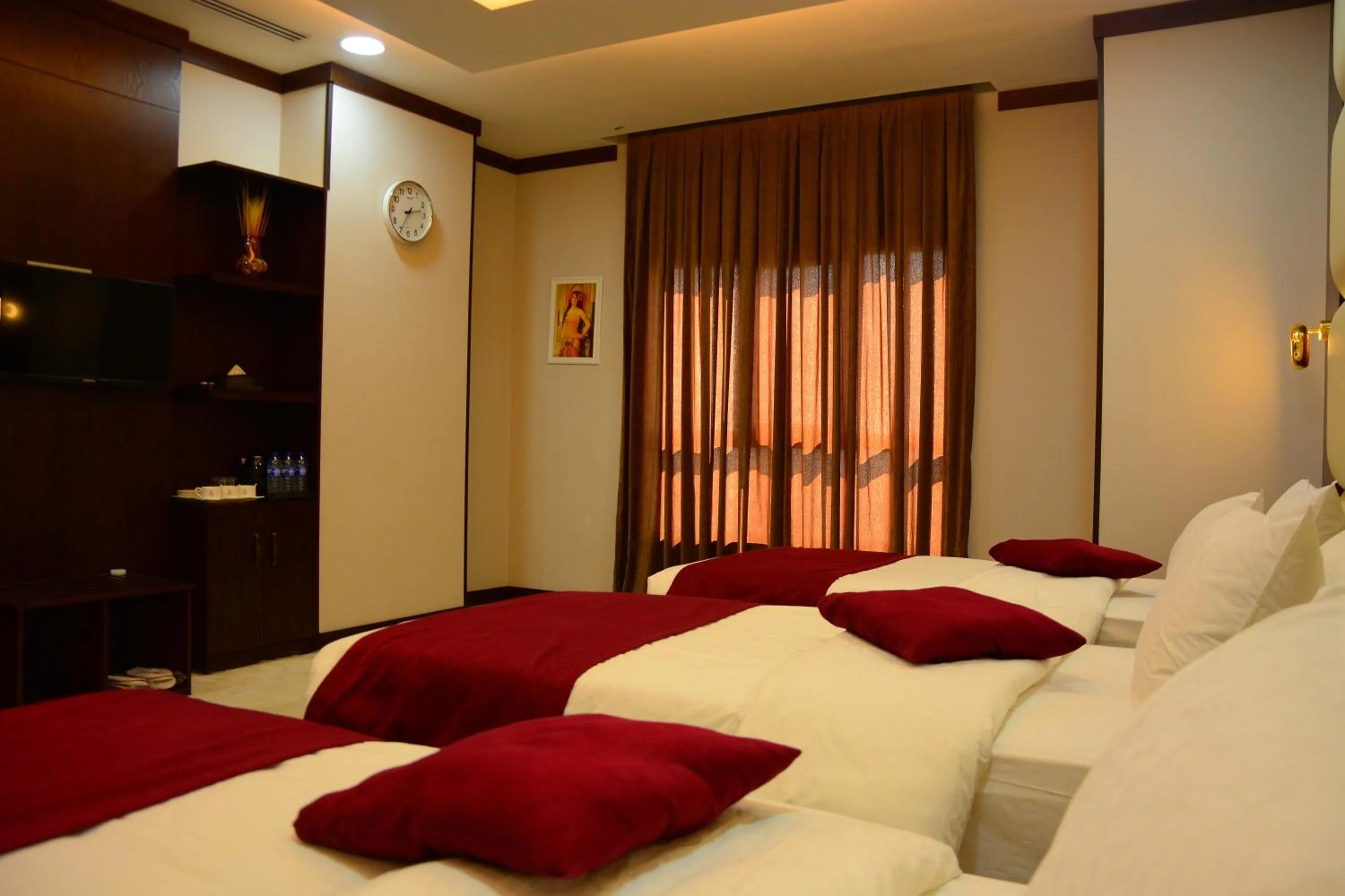 Bed in Paris Plaza Hotel